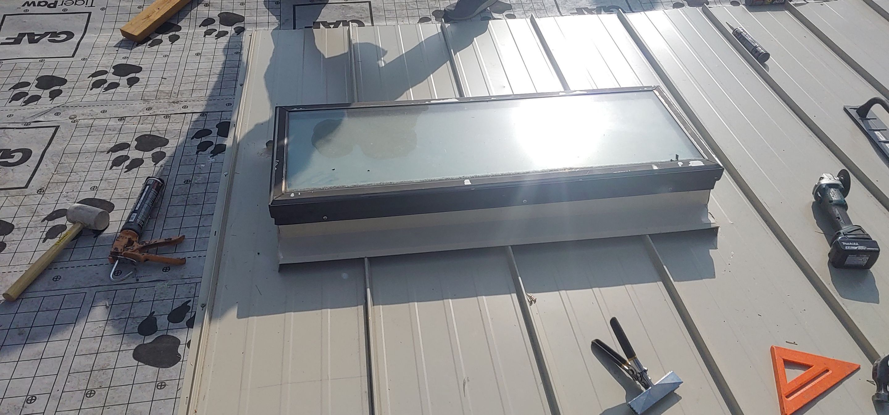 Residential Roofing Installation using Standing seam metal roofing system by Straight Edge Roofing Inc