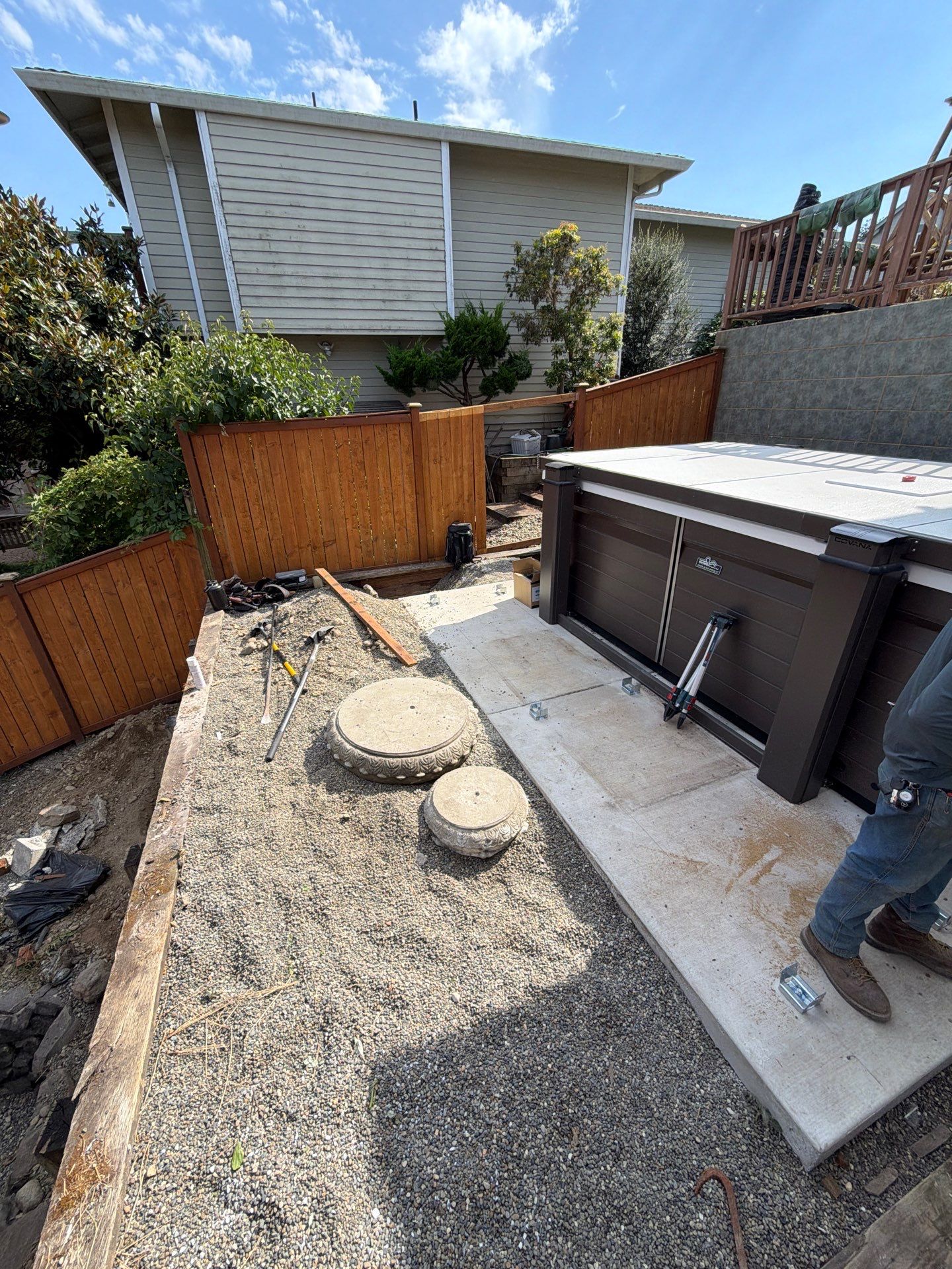 Tacoma Custom Composite Deck and Hot Tub Surround with Retaining Wall by Emerald City Energy 