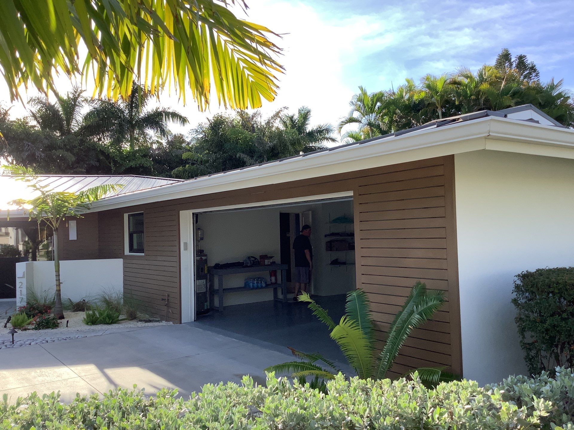 White Seamless Gutters and Downspouts in Sarasota FL by Gutter Professors