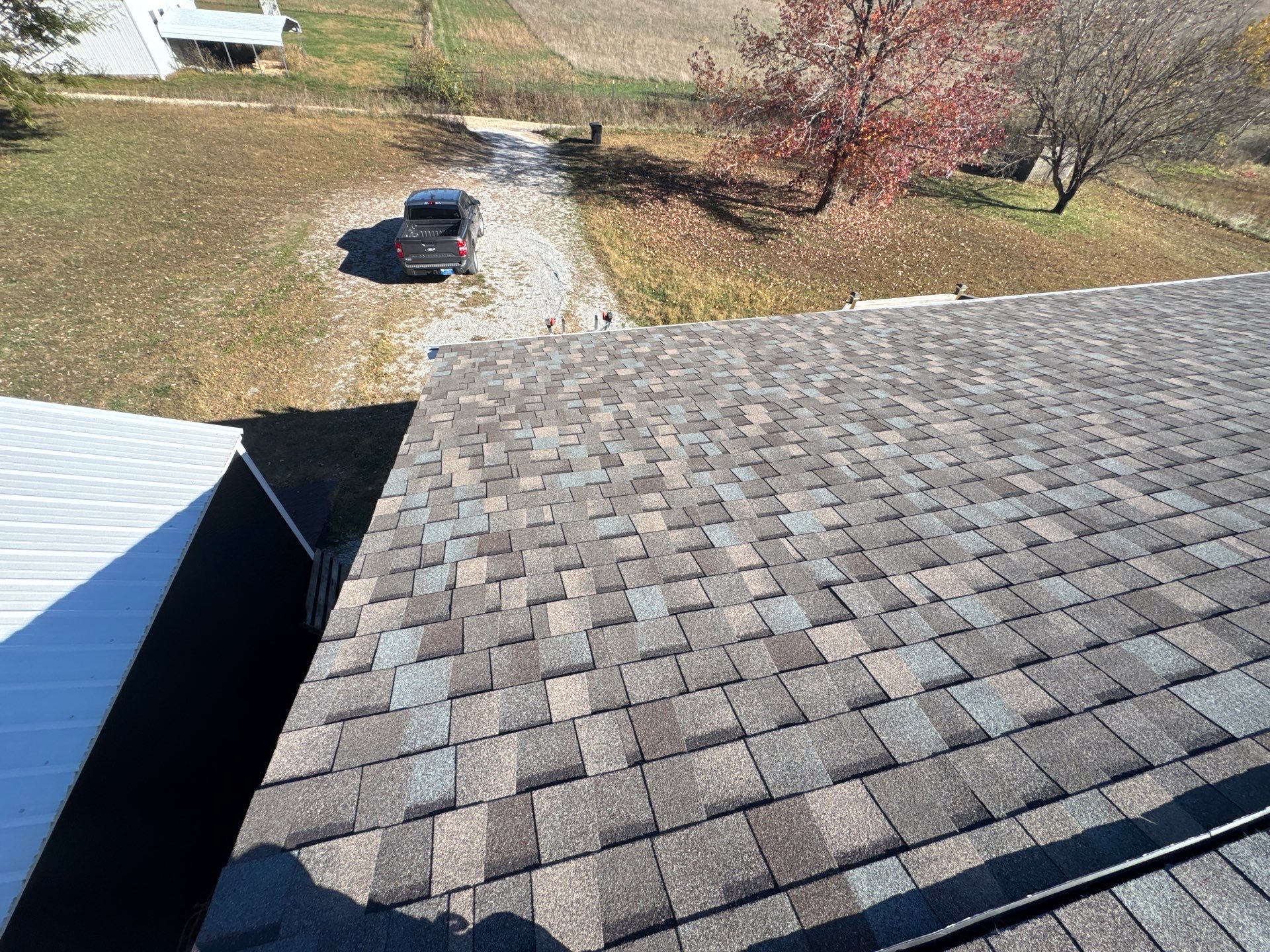 Residential Roofing & Downspouts Install  by Titan Commercial & Residential Roofing 