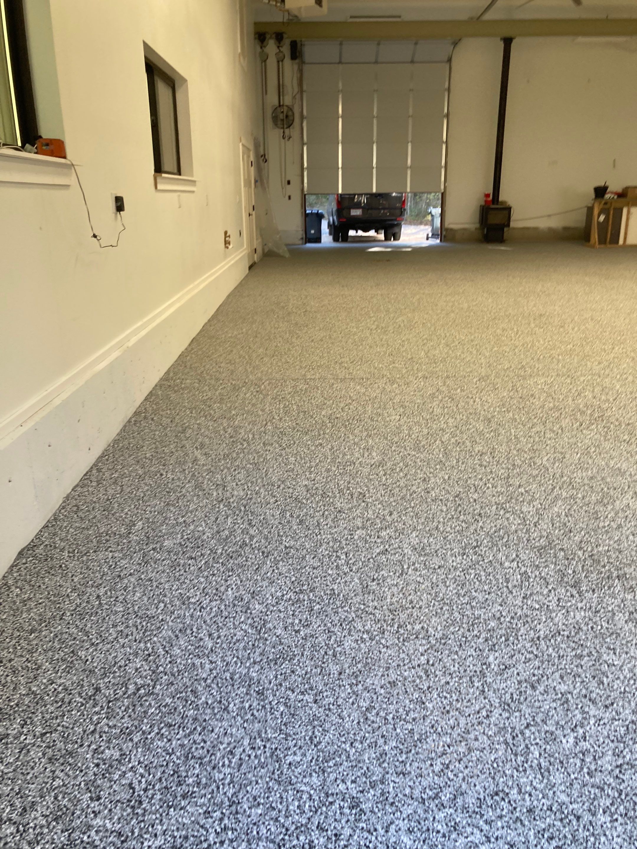 Garage Transformation using Domino and the Penntek Evolution System by Croc Coatings, LLC