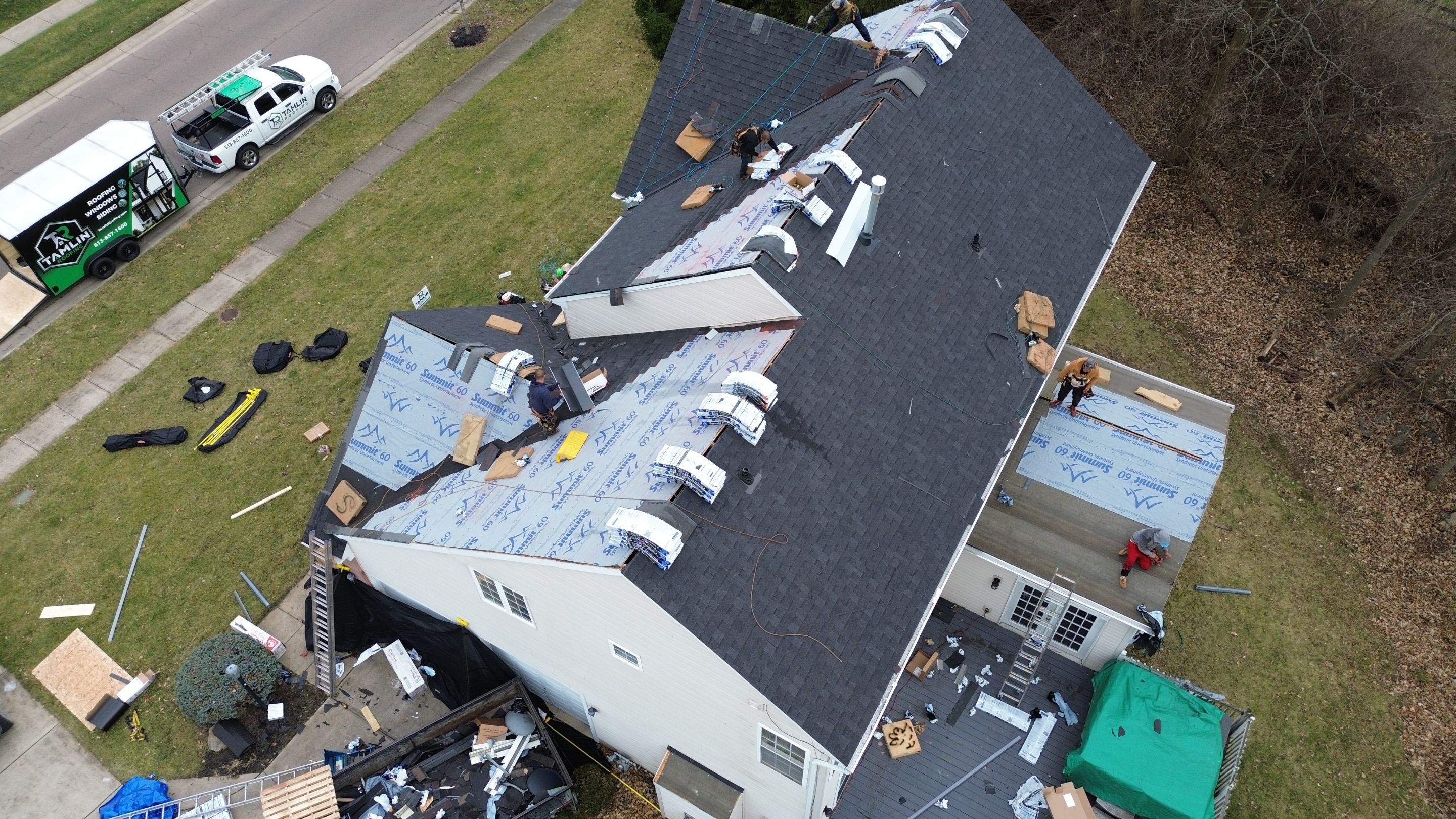 Walden Ponds - Pristine Black and Hydro Flo Gutter Guards by Tamlin Roofing