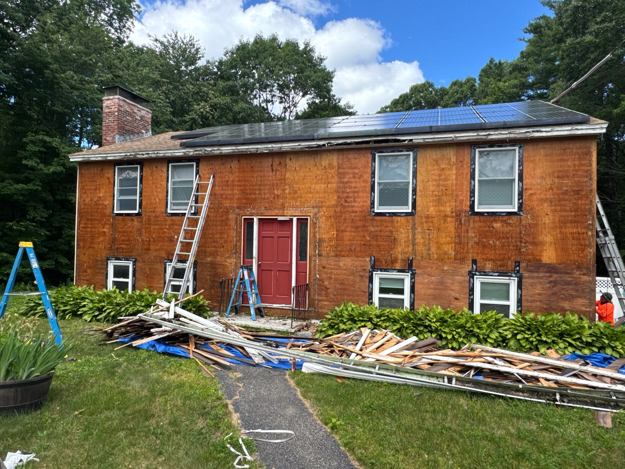 Full Siding Replacement in Newmarket, NH with CertainTeed Vinyl Siding and New Front Door Installation by Compass exteriors
