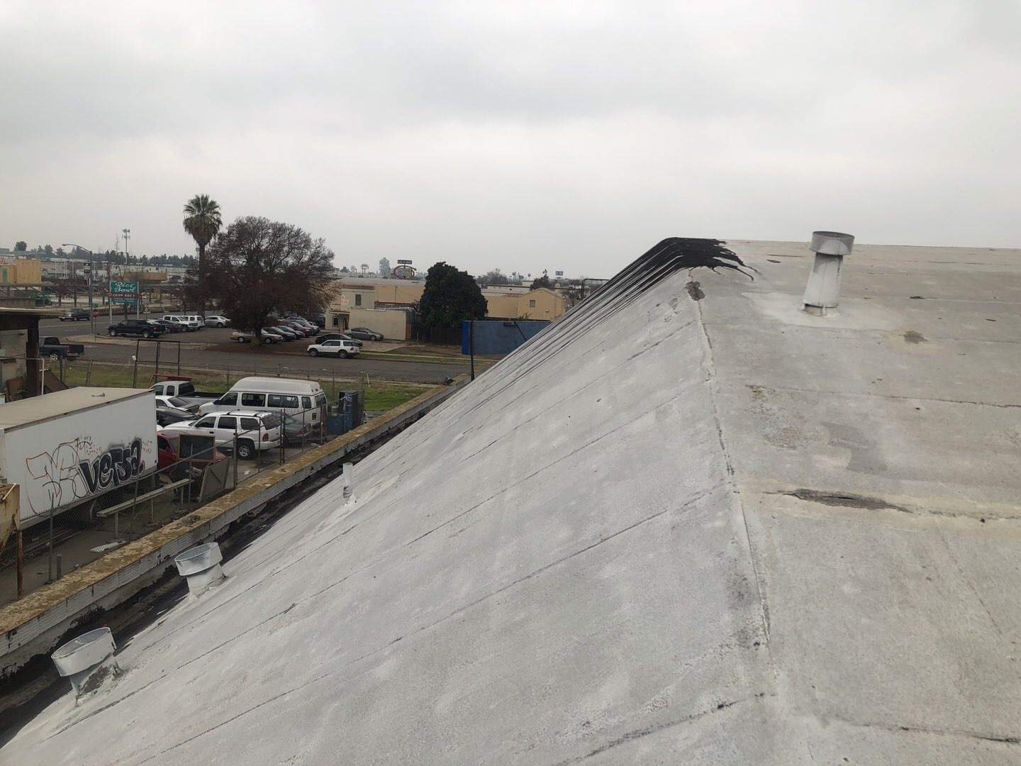 Spray foam and coatings using Conklin Benchmark/PUMA XL coatings and spray foam by Straight Edge Roofing Inc