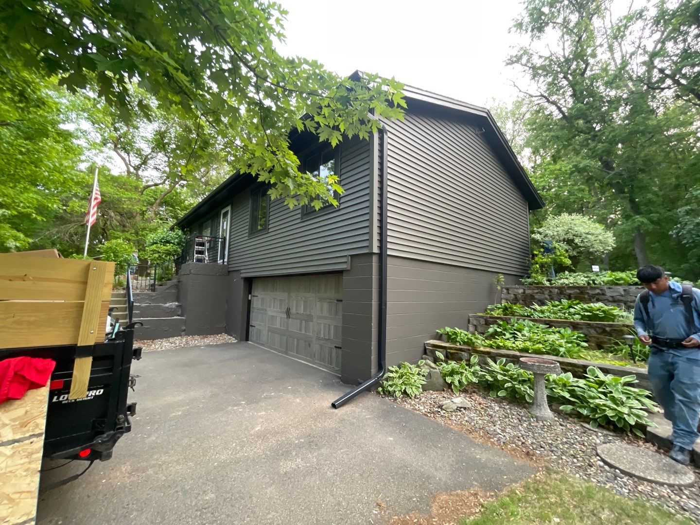Premium Exterior Remodel – Alside Charter Oak Siding, Hayfield Black Frame Windows, Edco Soffit & Fascia by First Impressions Exteriors