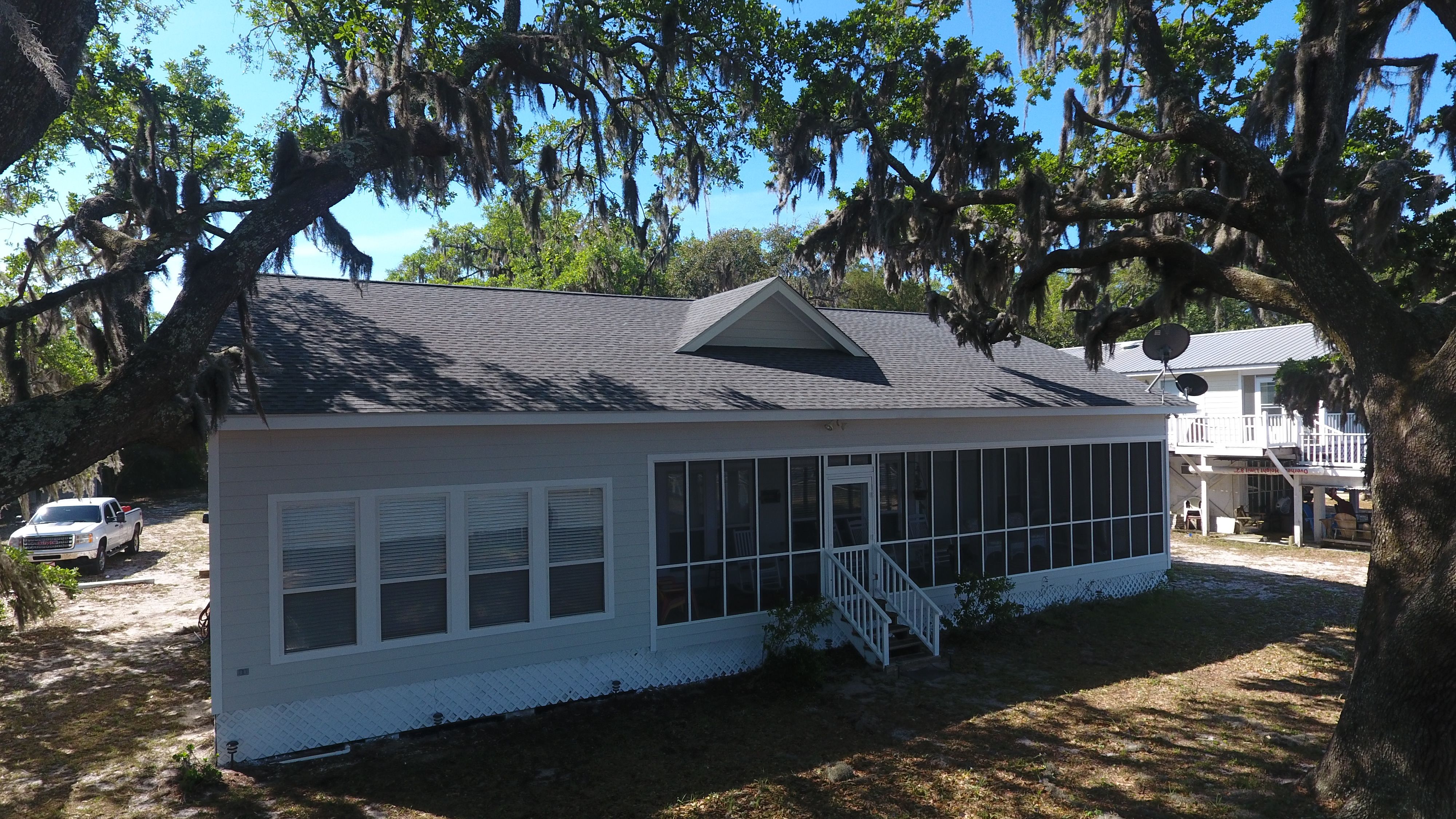 Residential Roofing Installation using Roof Replacement by American Roofing & Construction LLC