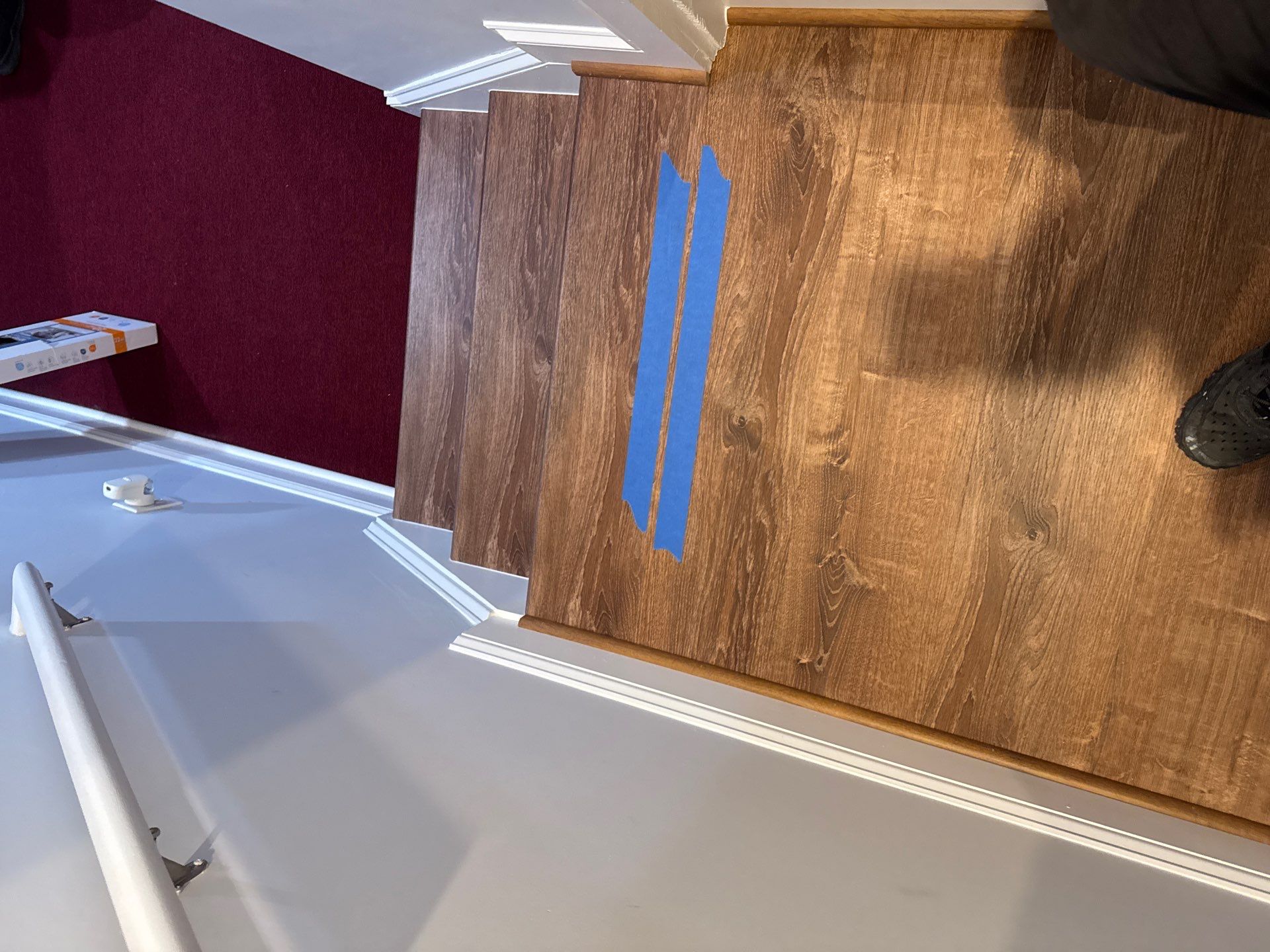 Stairway Installation using t vinyl stair tread and reversibleriser by La Bendicion Contruction Llc