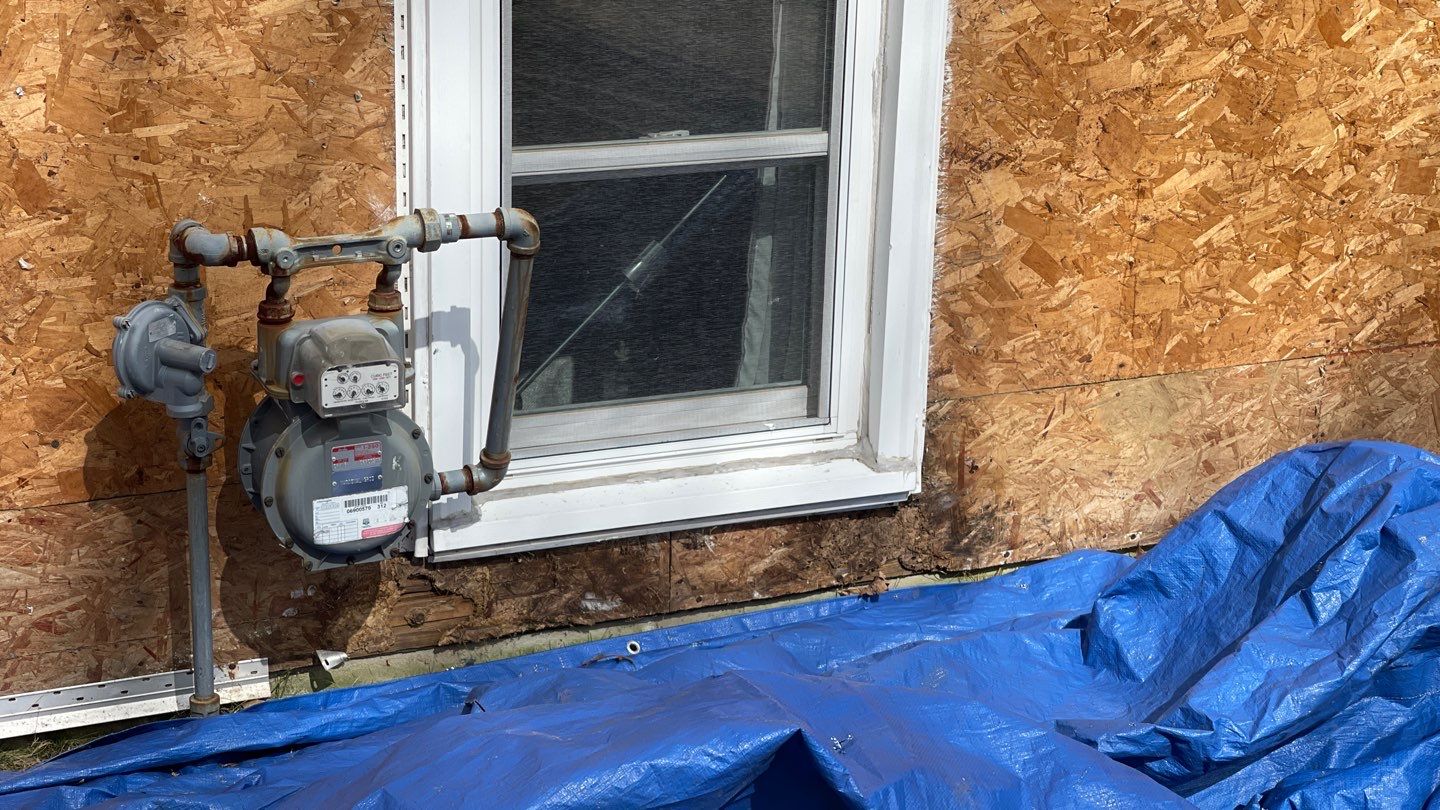 Complete Exterior Renovation with New Siding & Gutters   by Sensible Home Solutions