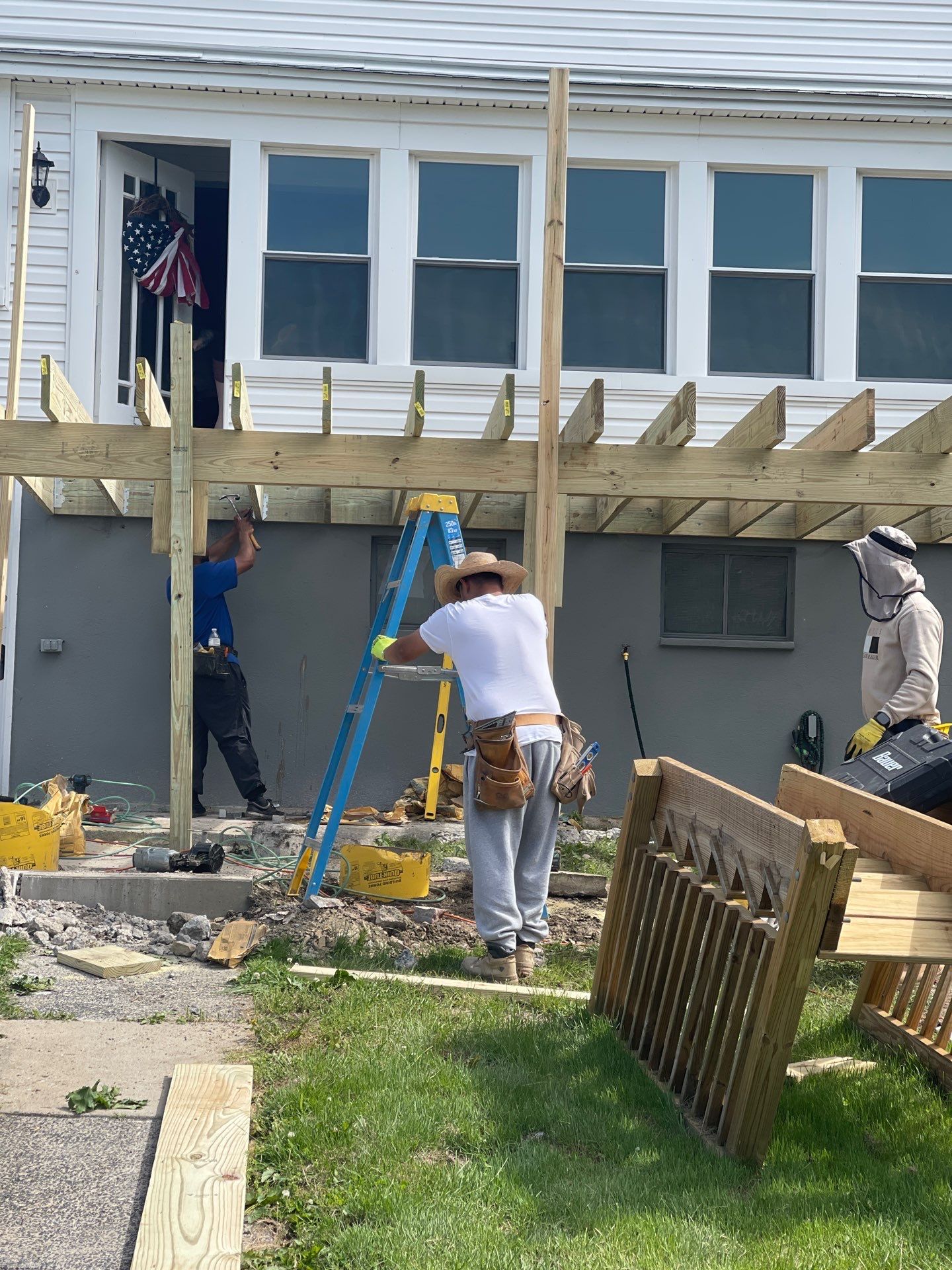 Pressure-Treated Wooden Staircase and Concrete Footing Installation in Schuylkill Haven by Herts Roofing & Construction