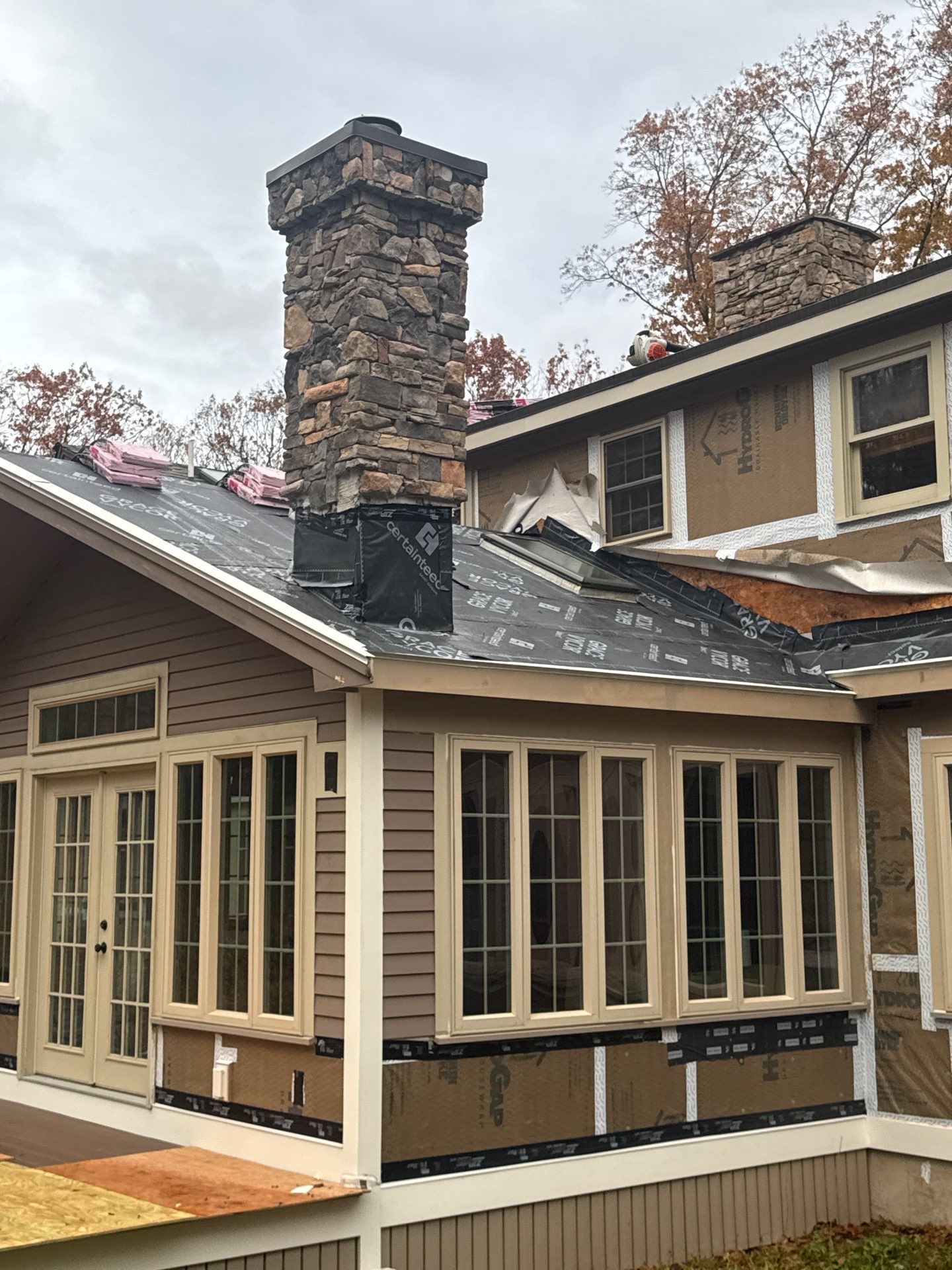Complete House & Barn Roof with 13 Skylight Reflashing + EPDM Repairs by Mighty Dog Roofing of Greater Middlesex County