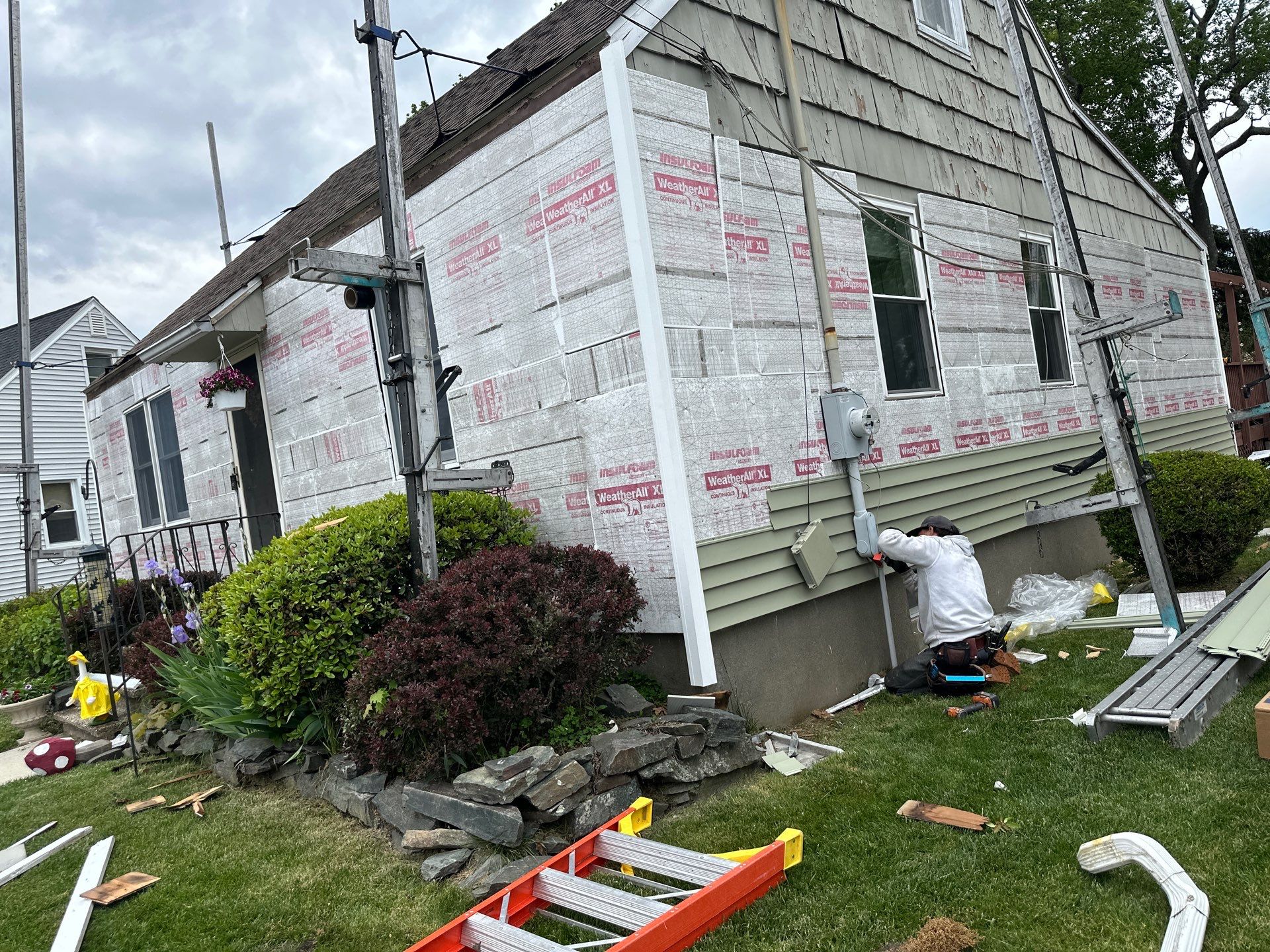 New Vinyl Siding Installation for Milford Home and Detached Garage by A Plus Exterior