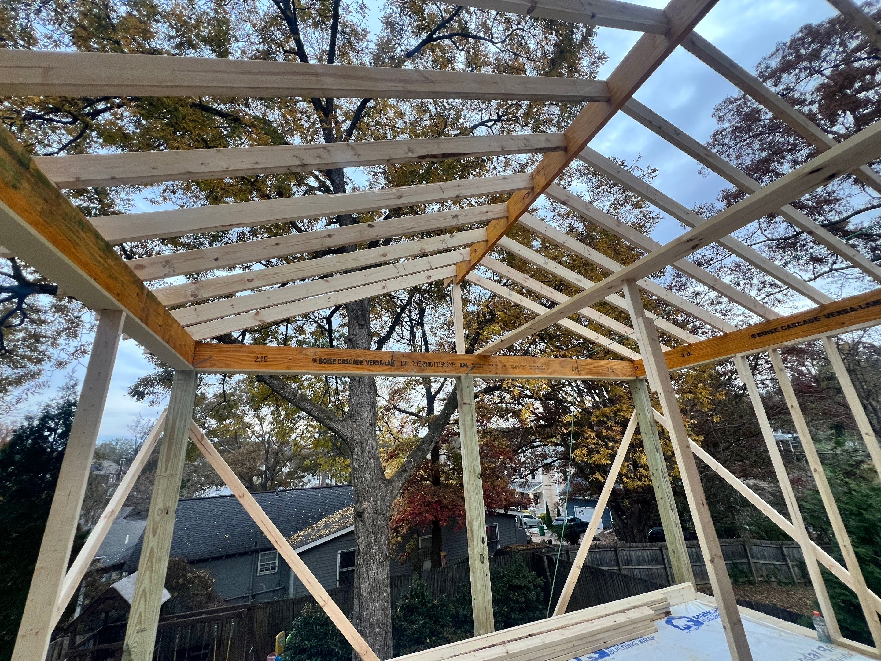 Screened-In Porch With Fireplace by Swift Home Renovations 