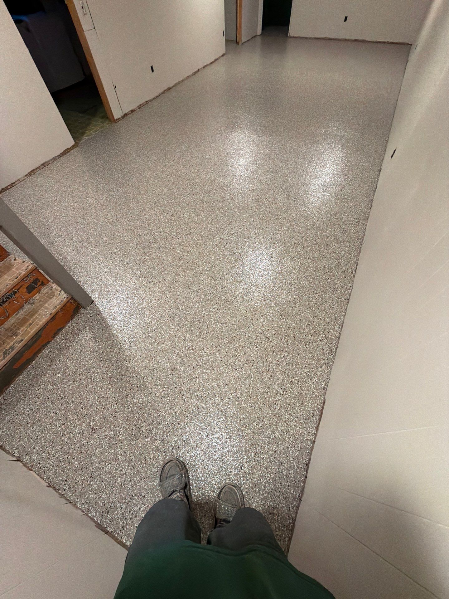 Custom Epoxy Flake Floor Installation for Spring Lake Residence by Gordon Painting