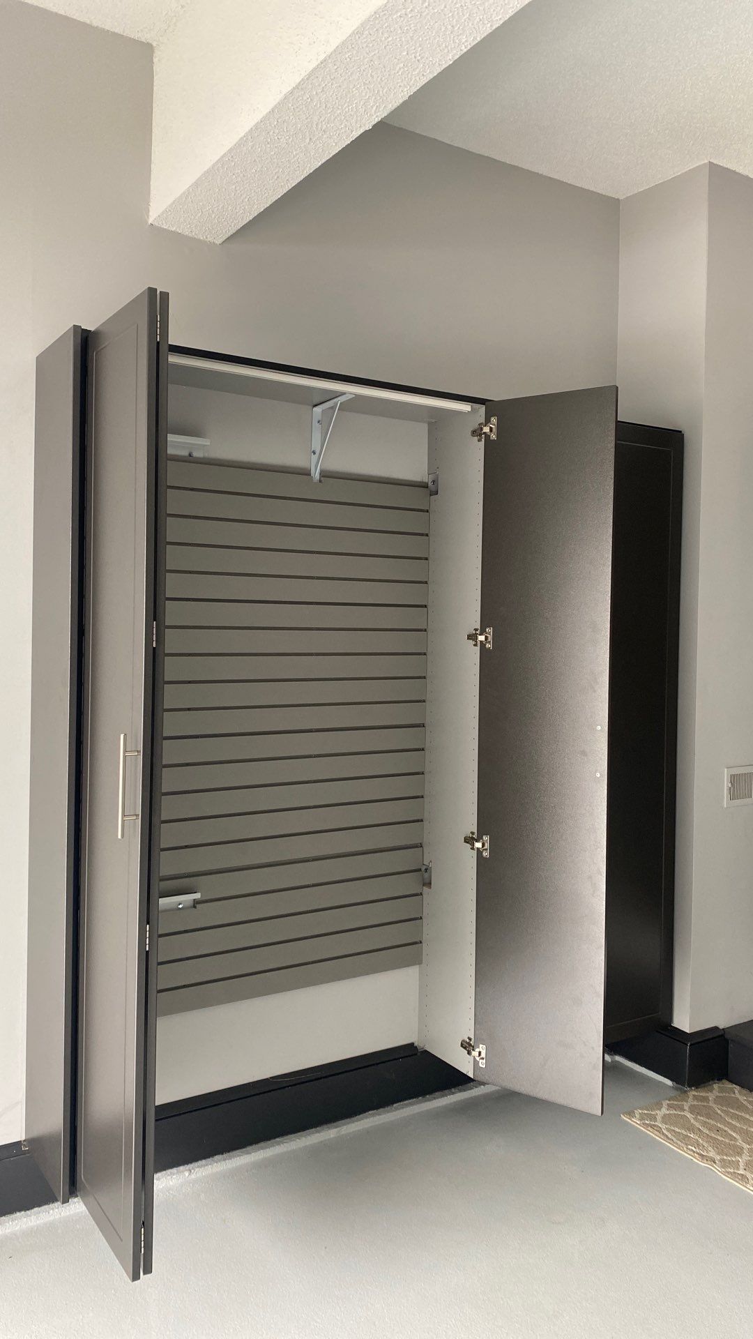 Doug M. adds storage to his garage! by Banner Garage