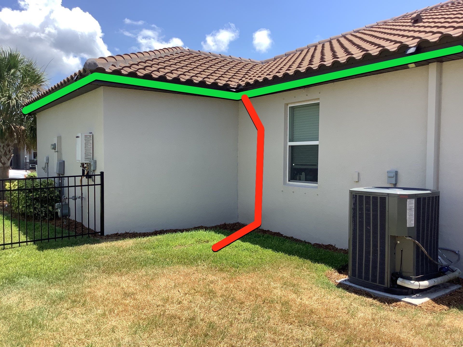 Musket brown seamless gutters with splash guards, new downspouts, and extensions in Bradenton, FL by Gutter Professors