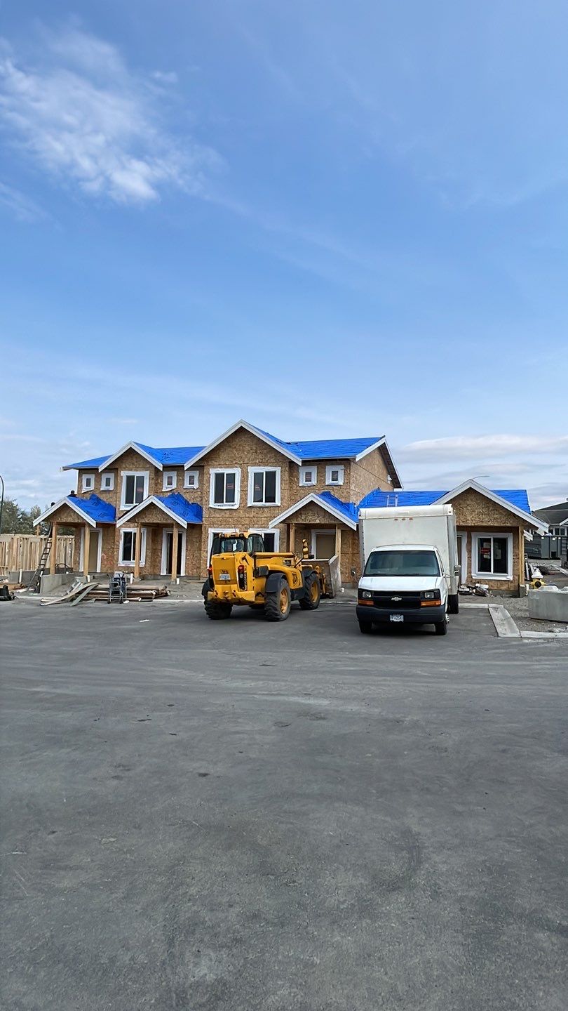 Residential Roofing Installation using OC Driftwood shingles by Top Notch Roofing Inc