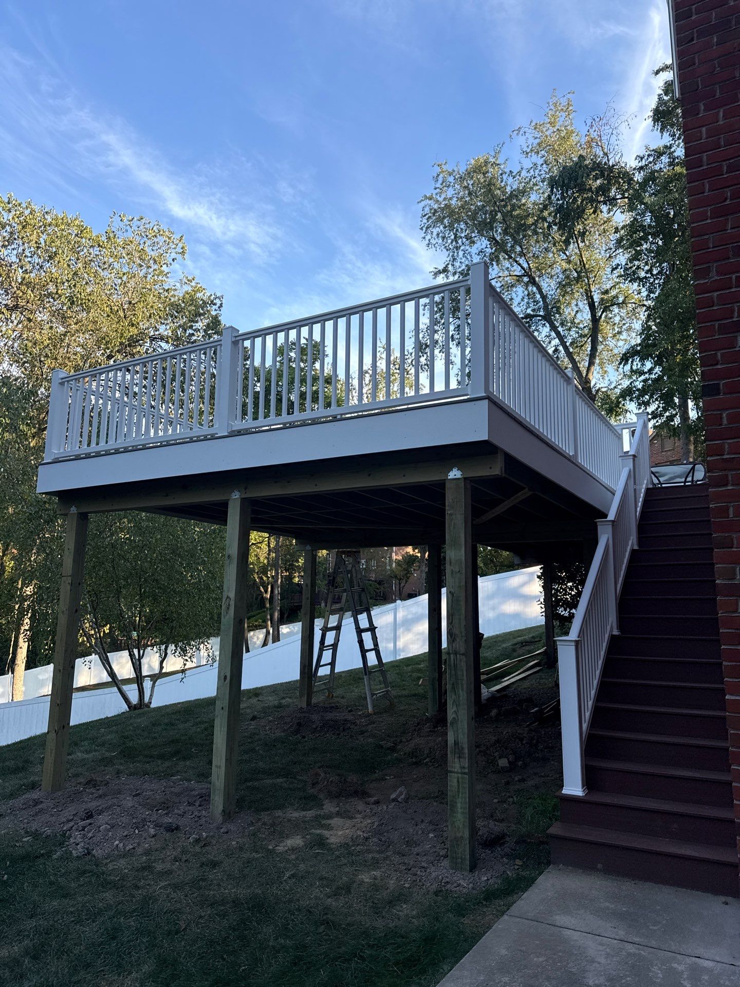 Deck extension  by Cousins Roofing Siding & Decks