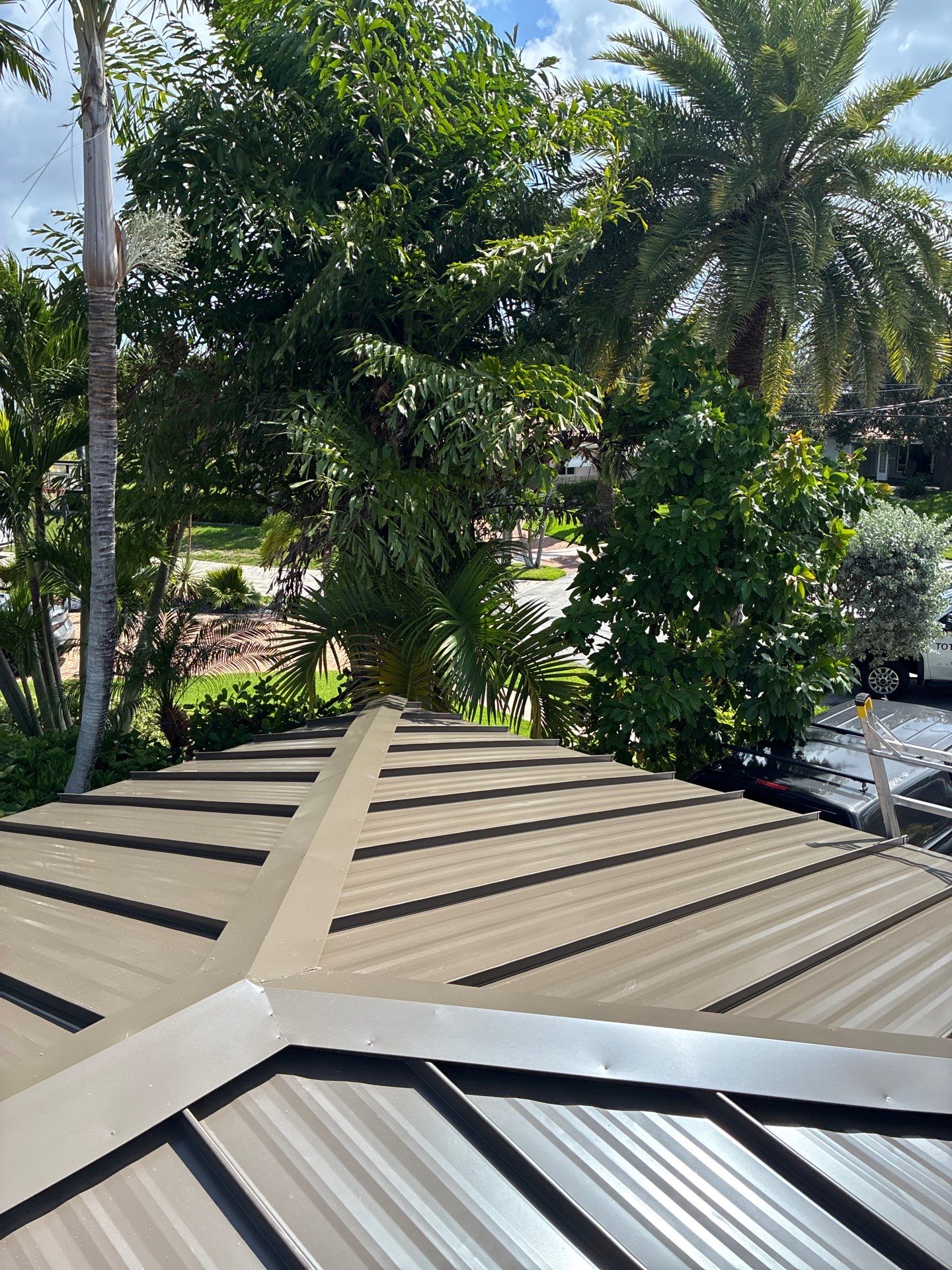 .032 Aluminum 1.5" Mechanical Seam Medium Bronze by Total Roofing System The Metal Roof Experts