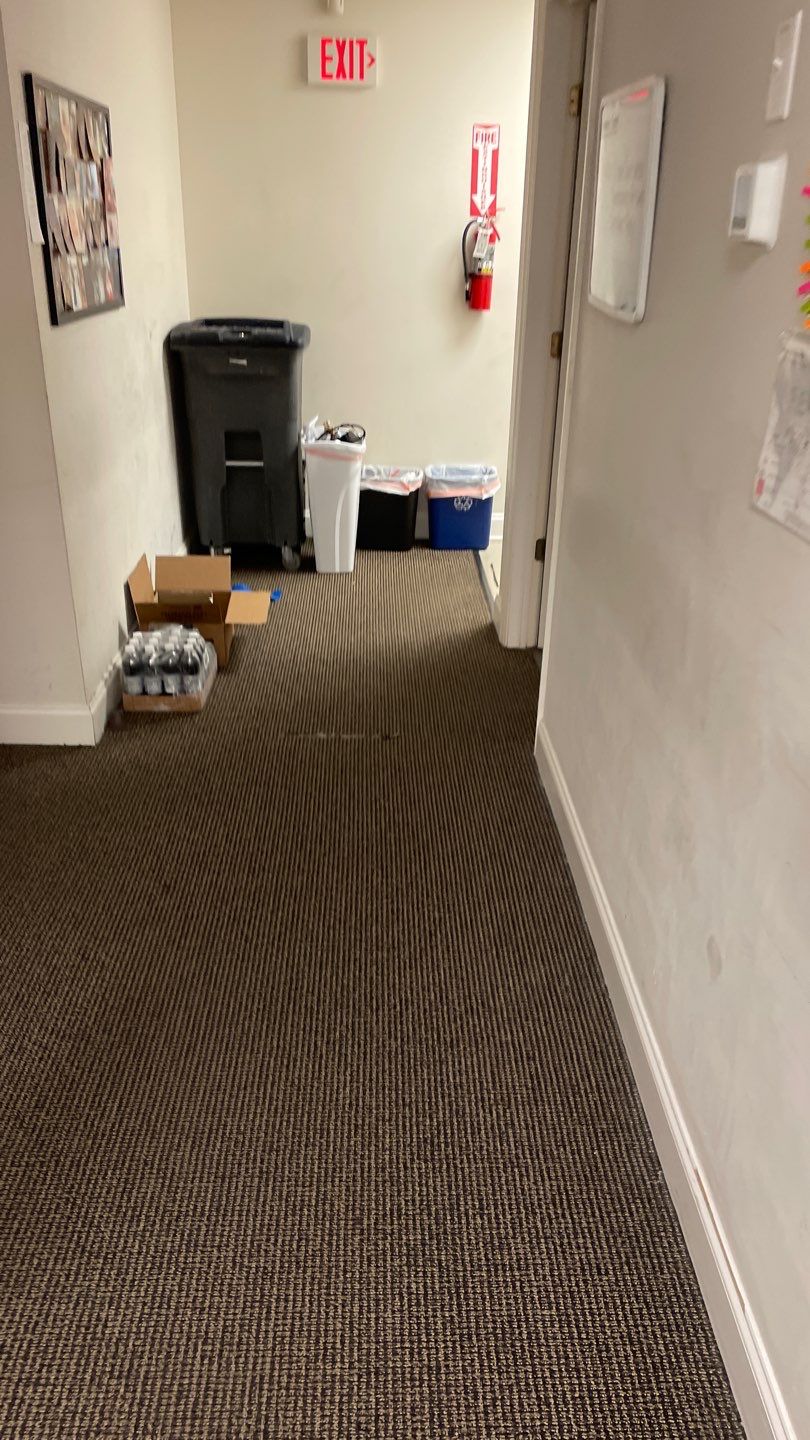 Office Remodel from Worn Out Carpet to Sleek Glued Down LVP by Footprints Floors of Coastal Carolina