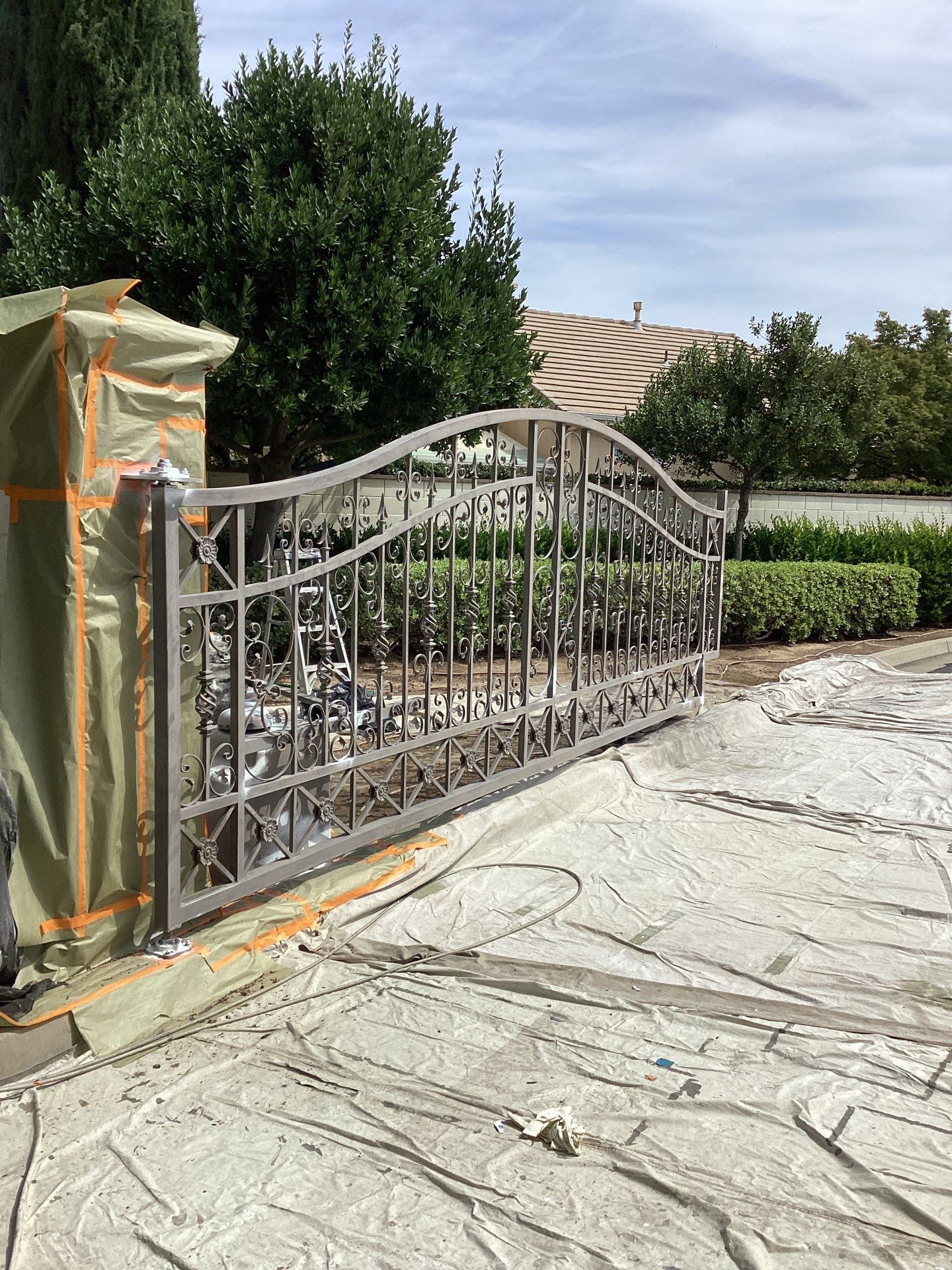 Exterior Painting Iron Gates in Modesto by Lancaster Painting