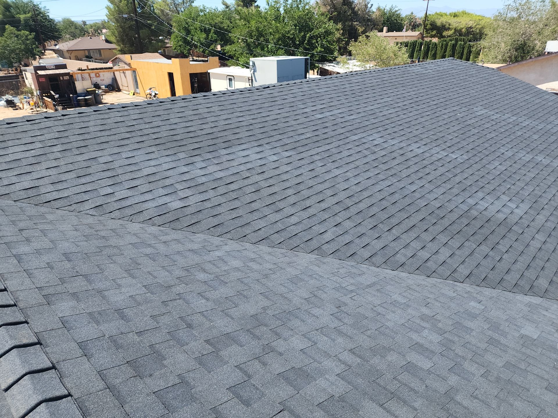 Onyx Black Shingles by Reimagine Roofing