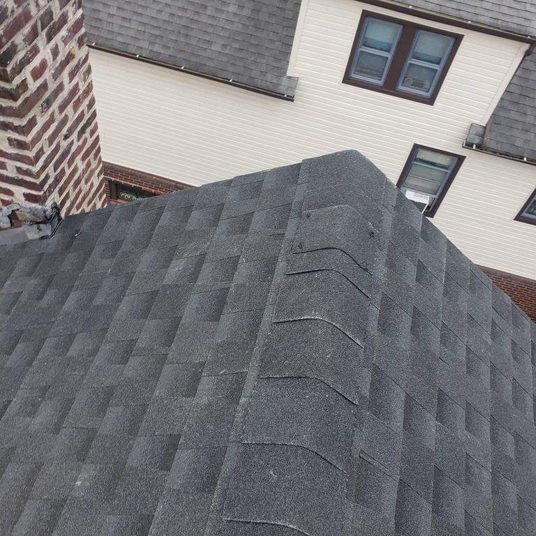 New Roof & Gutters by Island Roofing Inc.