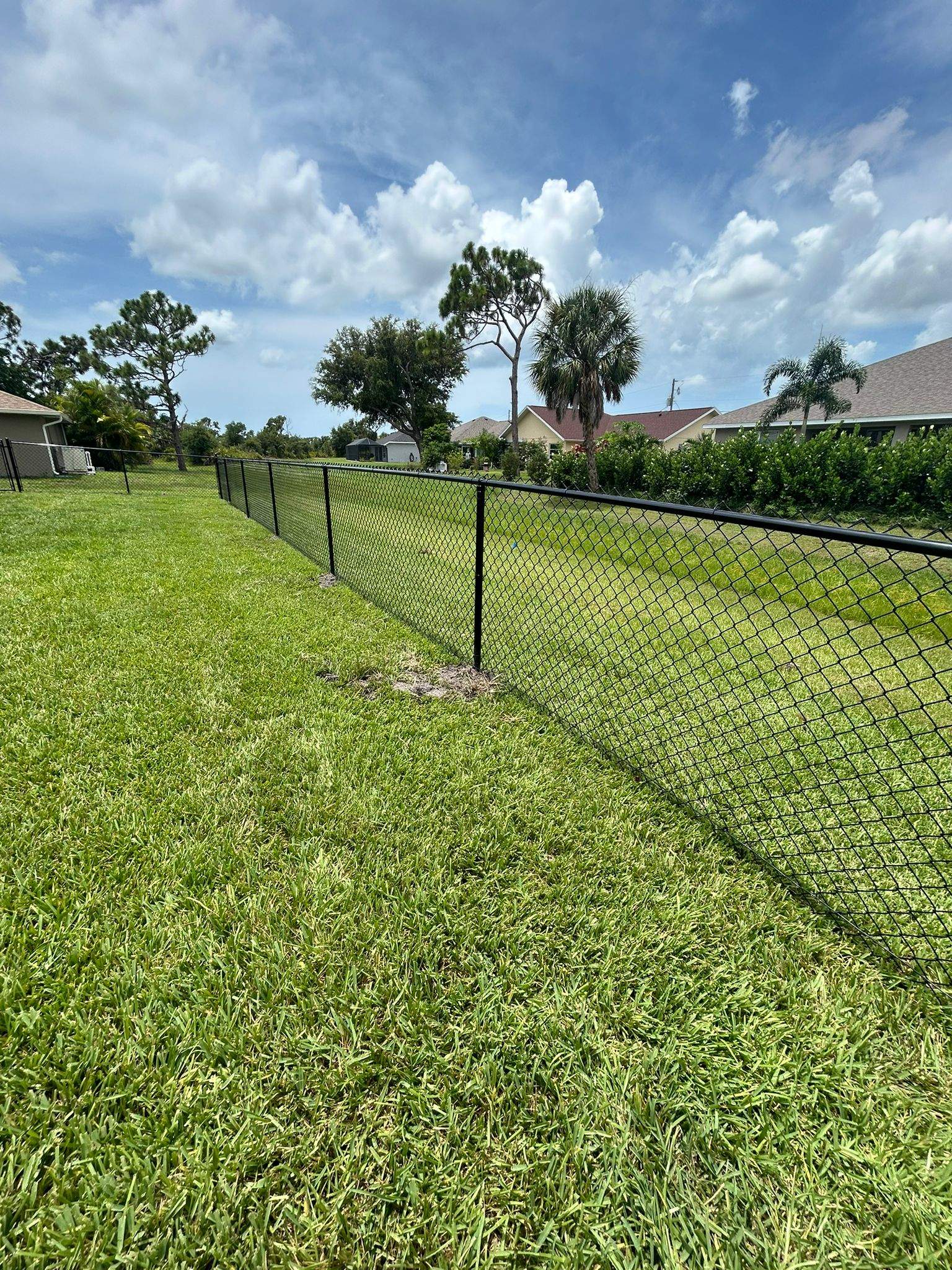 Black Chain Link Fence Installation in Rotonda West by True Fence LLC