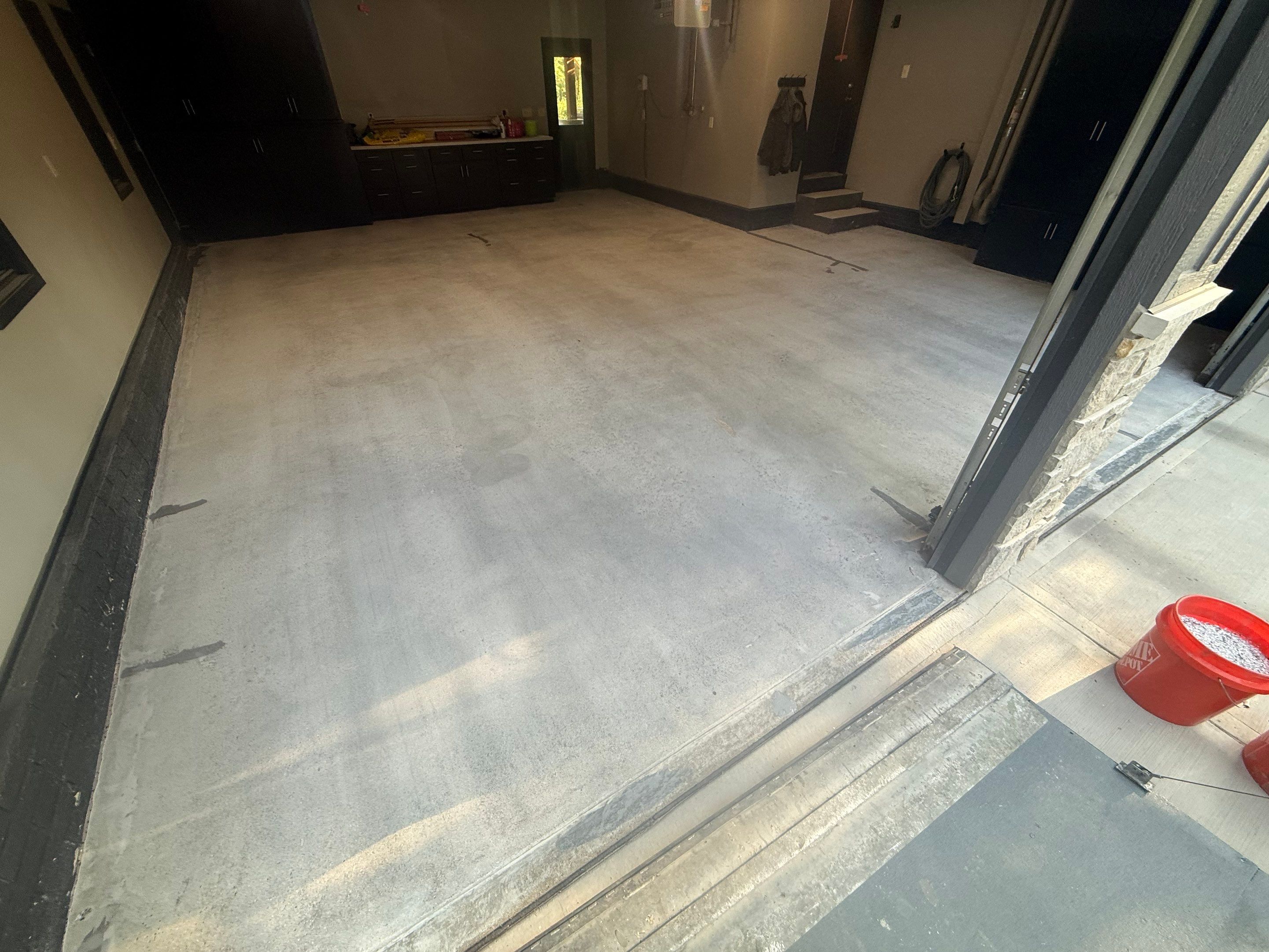 Garage Floor and Textured Pool Deck Coating in Sioux Falls by Select Painting, Coatings & Garage Cabinets