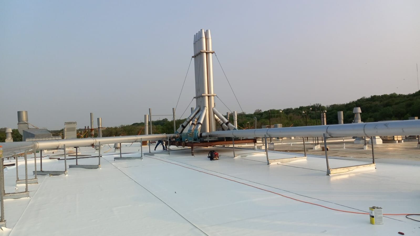 AML Riverside  by Grell Roofing, LLC