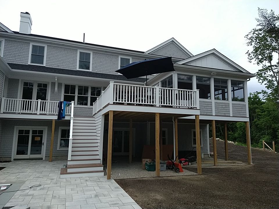 K-Style Gutter Installation with Round Downspouts in Marshfield, MA by Gutter Pro Enterprises