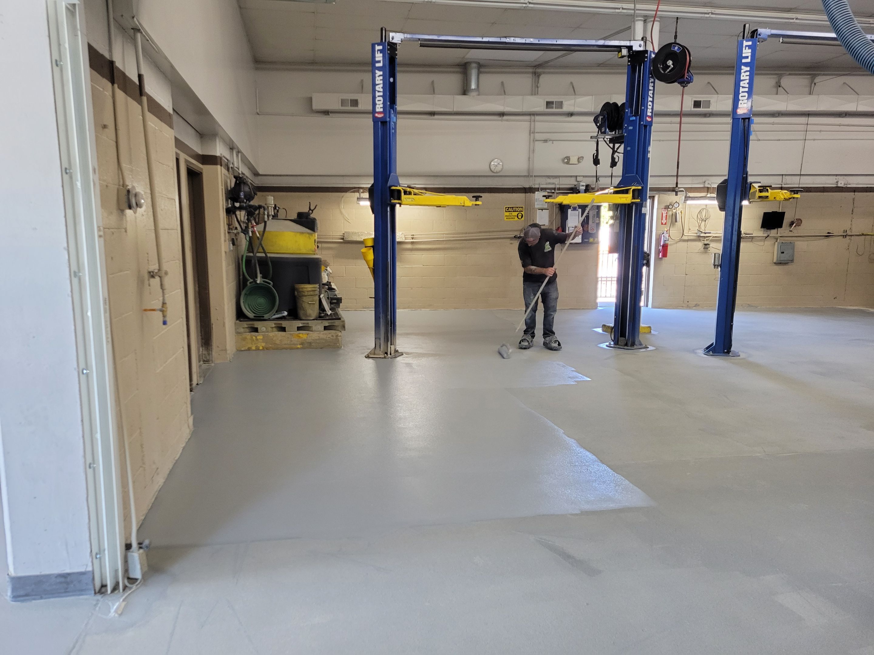 Commercial Floor Transformation using Penntek Shop Floor System by Croc Coatings, LLC