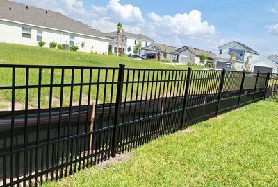 Aluminum Fence Installation using Black 3 Rail Aluminum Fence