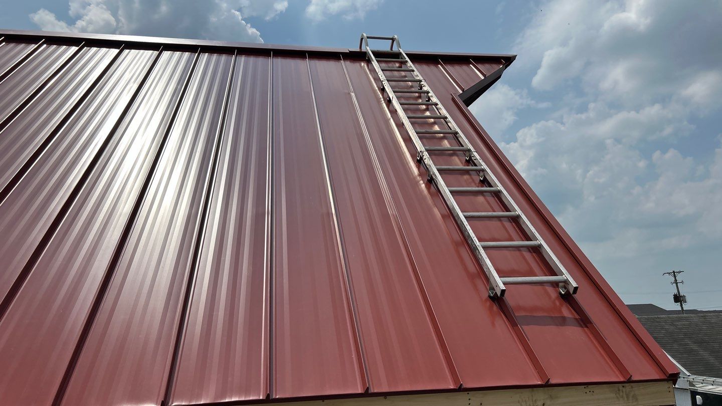 Residential Roofing Installation using Standing Seam Metal - Barn Red by RoofX 