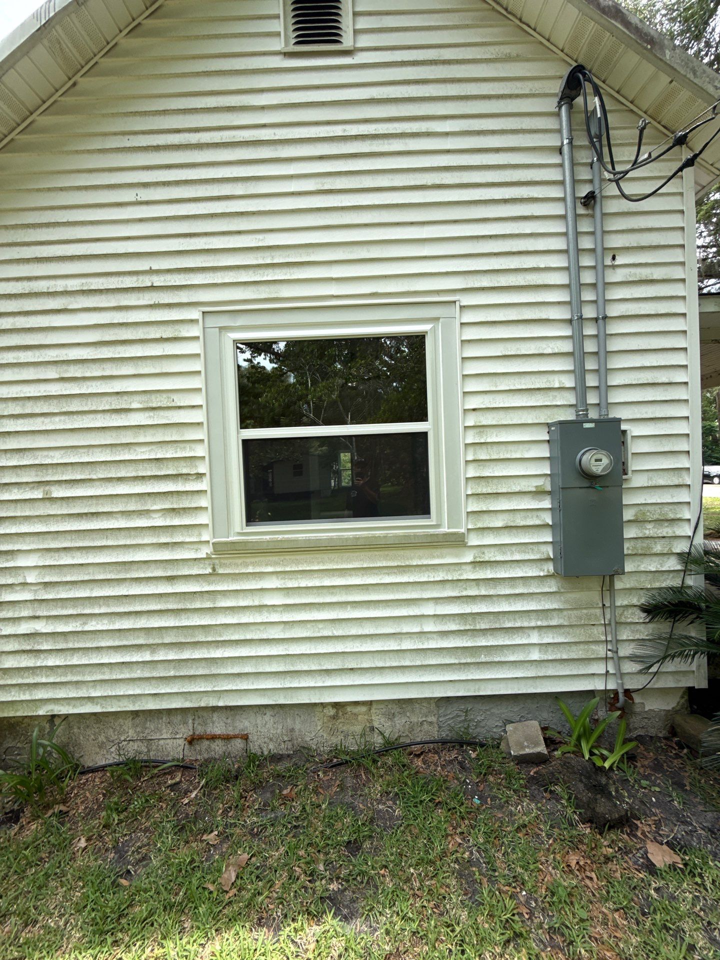 White Vinyl Window Replacement for Residential Home in Williston by Windows & Doors Store