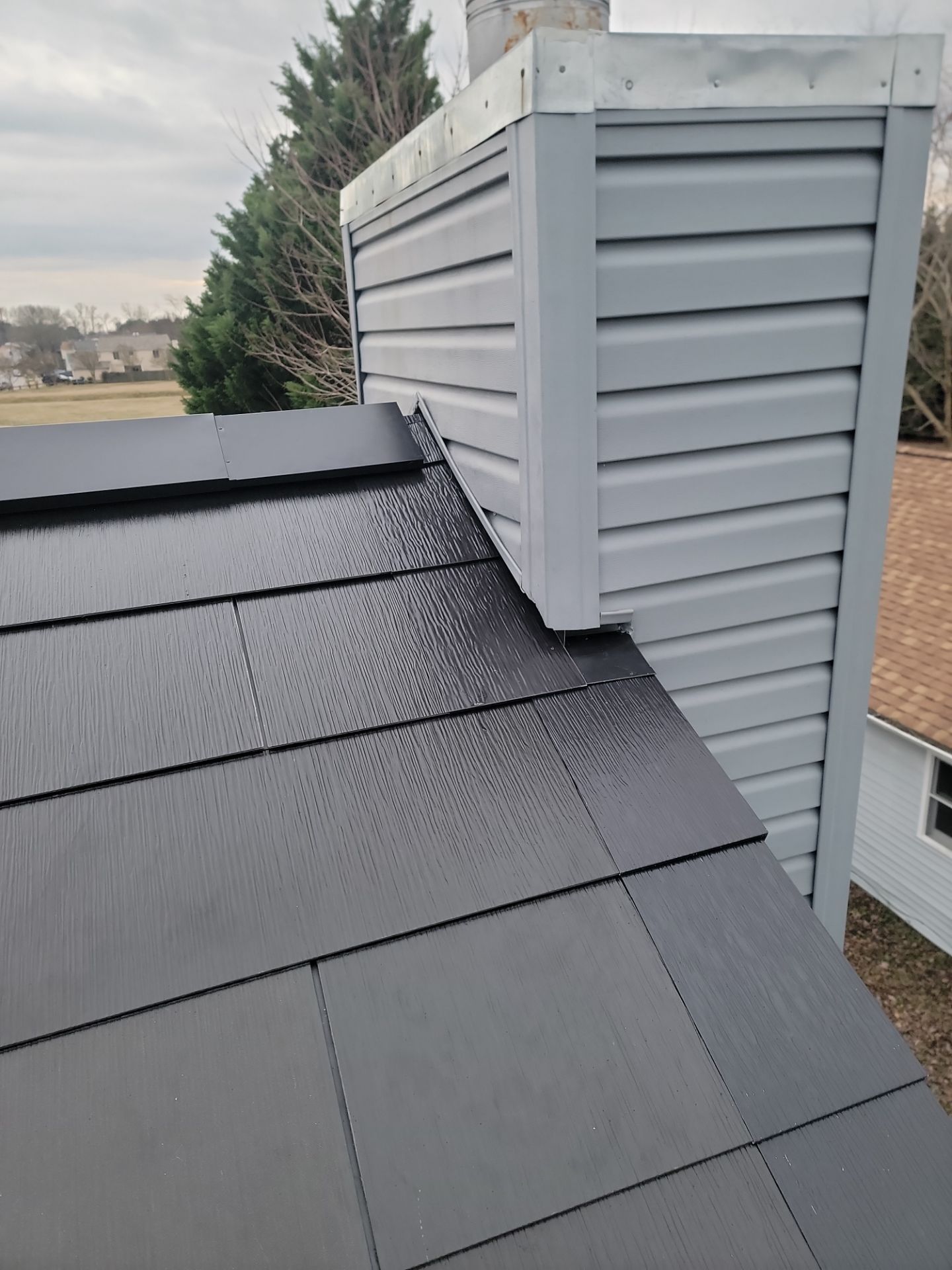 Tesla Solar Roof + Powerwall in Virginia Beach, VA by American Home Contractors