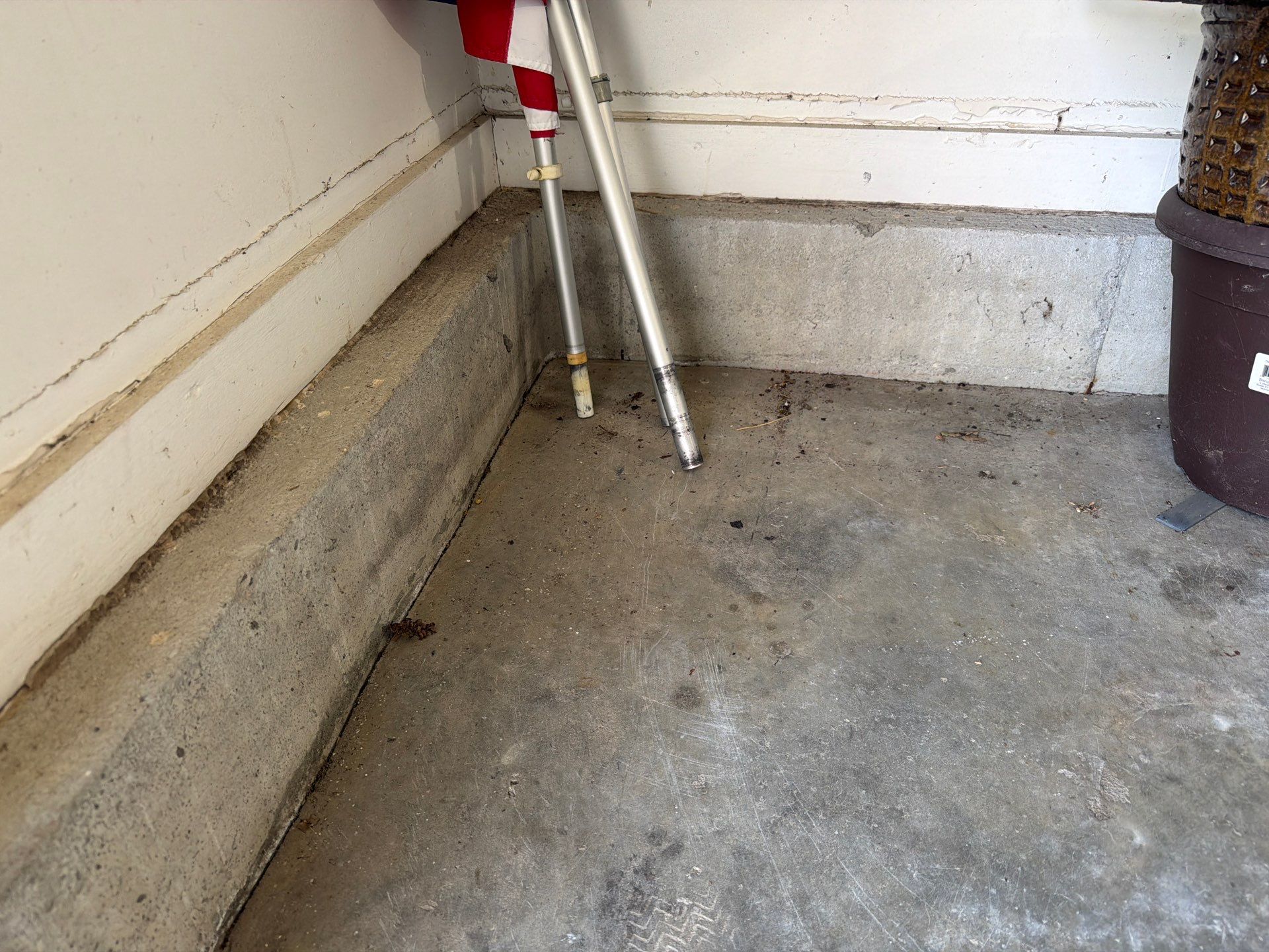 Residential Garage Floor Coating with Feather Grey Finish in Sioux Falls by Select Painting, Coatings & Garage Cabinets