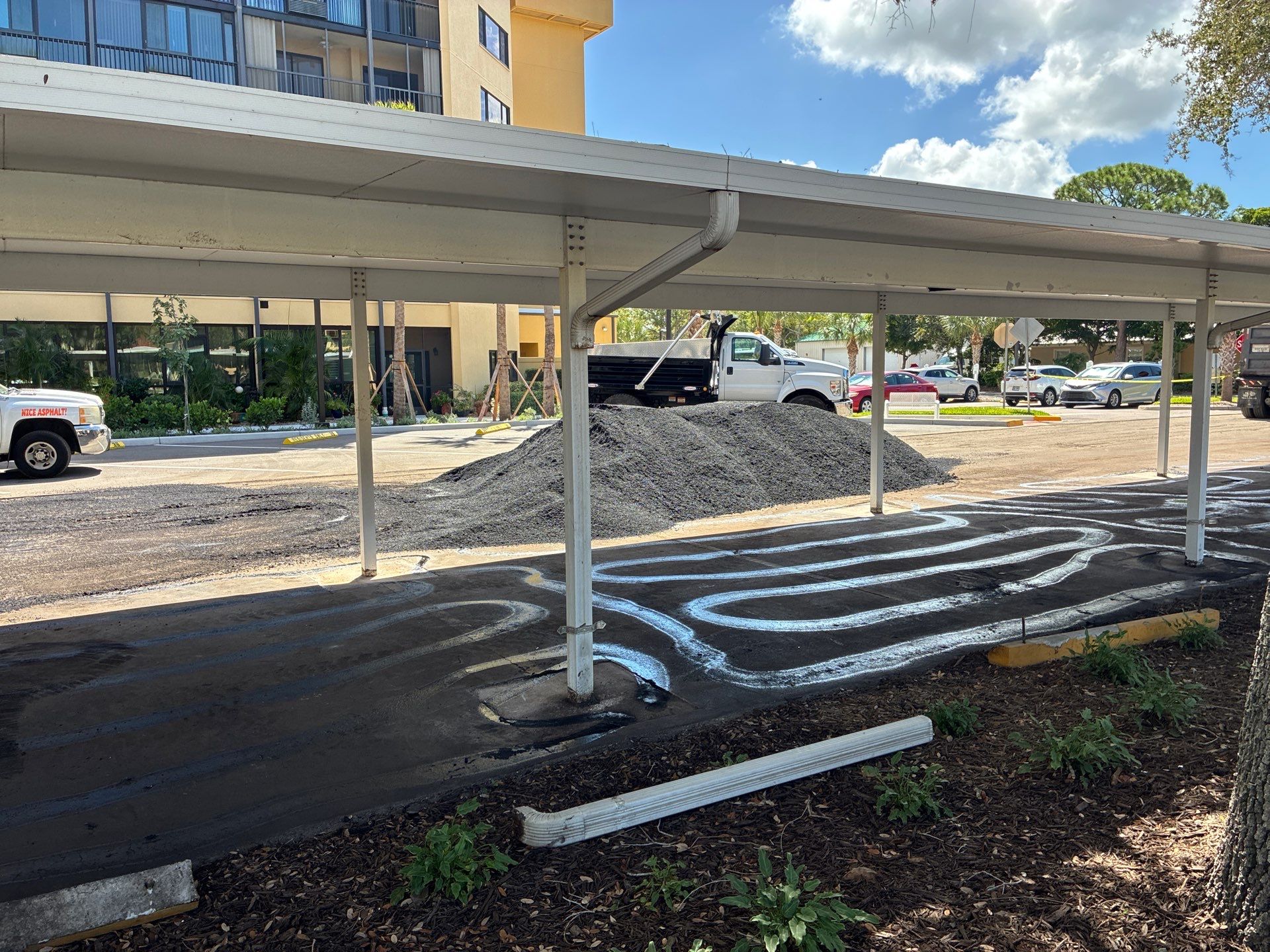 Comprehensive Parking Lot Mill and Overlay with Custom Line Striping in Venice by Everline Coatings & Services - Southwest FL