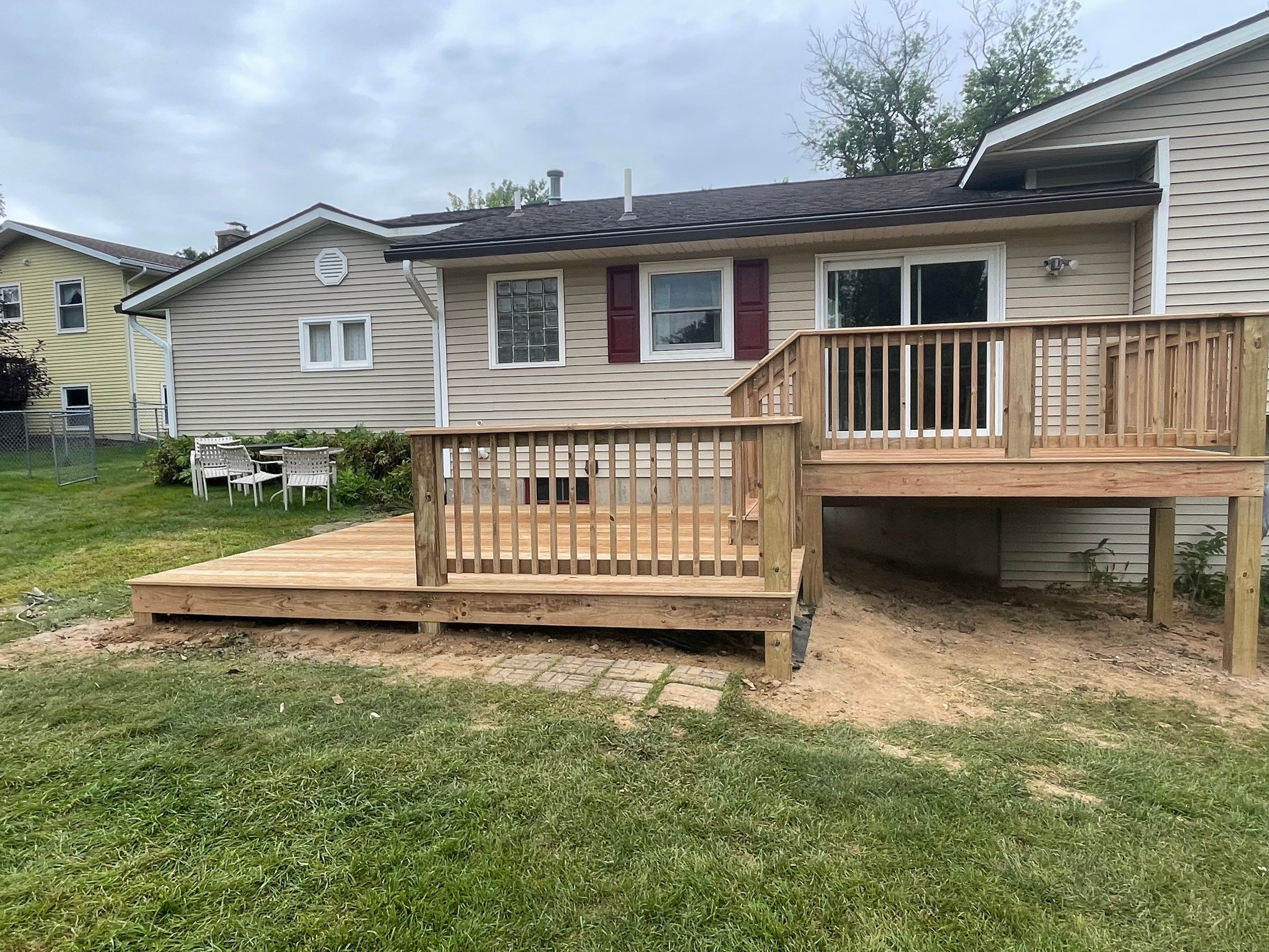 Deck Installation using Treated Lumber by Avalon Roofing and Exteriors