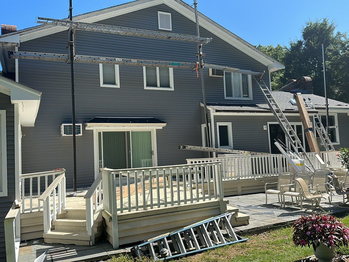 Residential Roofing Installation using Owens Corning TruDefinition Duration AR - Onyx Black & New Siding Using Mainstreet Charcoal Gray by A Plus Exterior