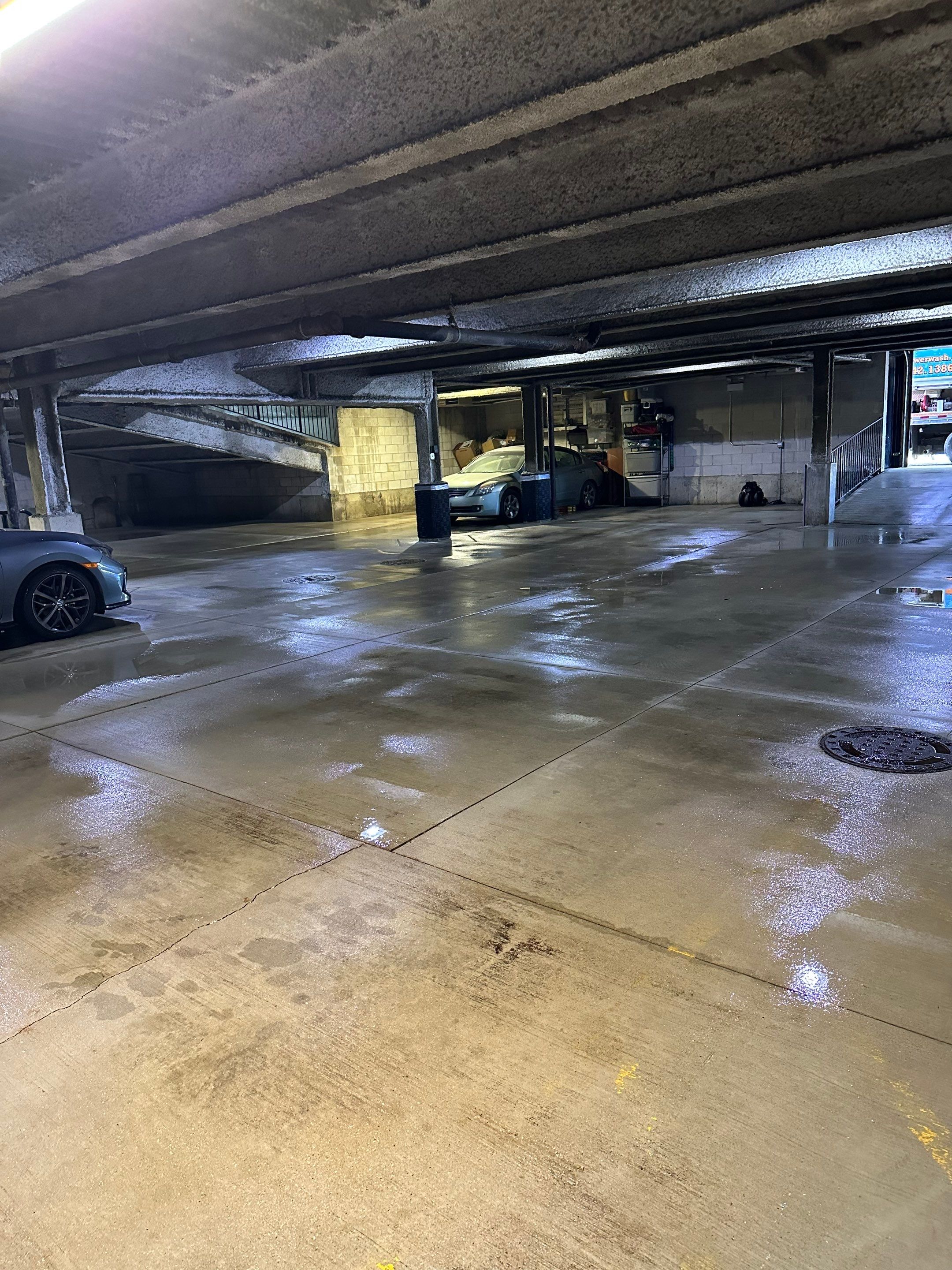Parking garage cleaning using Hot water by Northern Power Washing LLC.