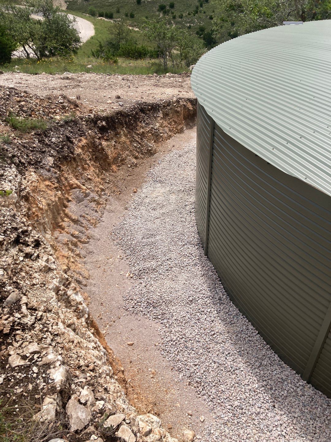 Residential Rainwater Collection System - Pioneer 40K gallon water tank in Mangrove Green by Hill Country Rain Water