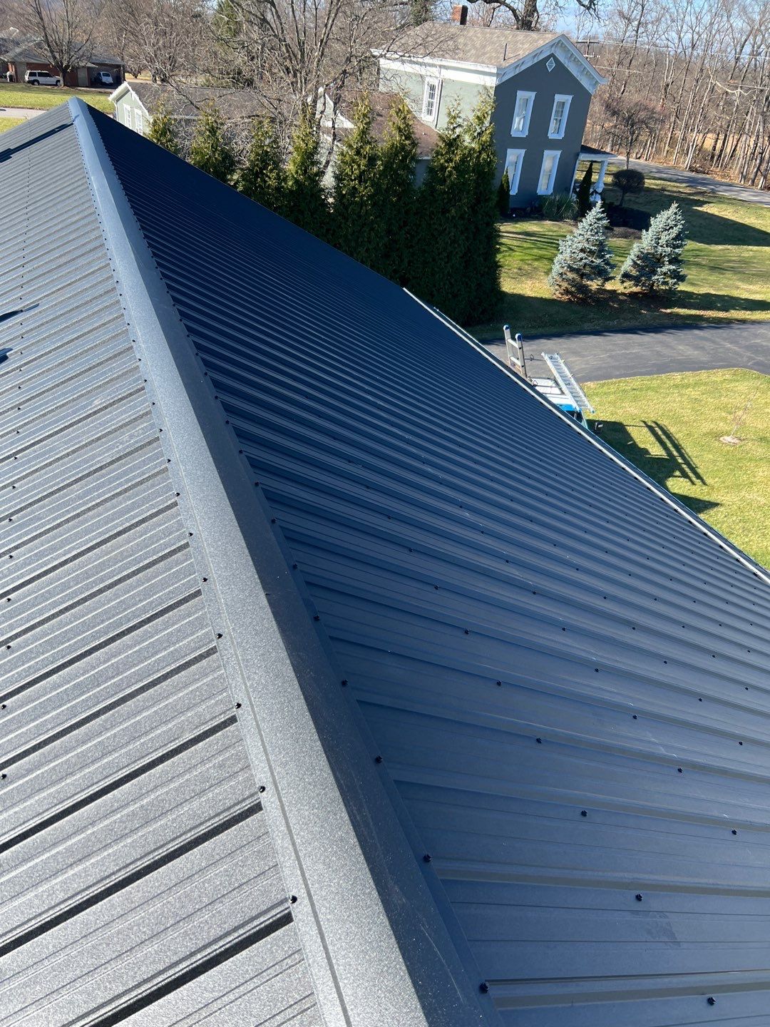 Residential Roofing Installation using Performance Panel Metal - Frost Black by RoofX 