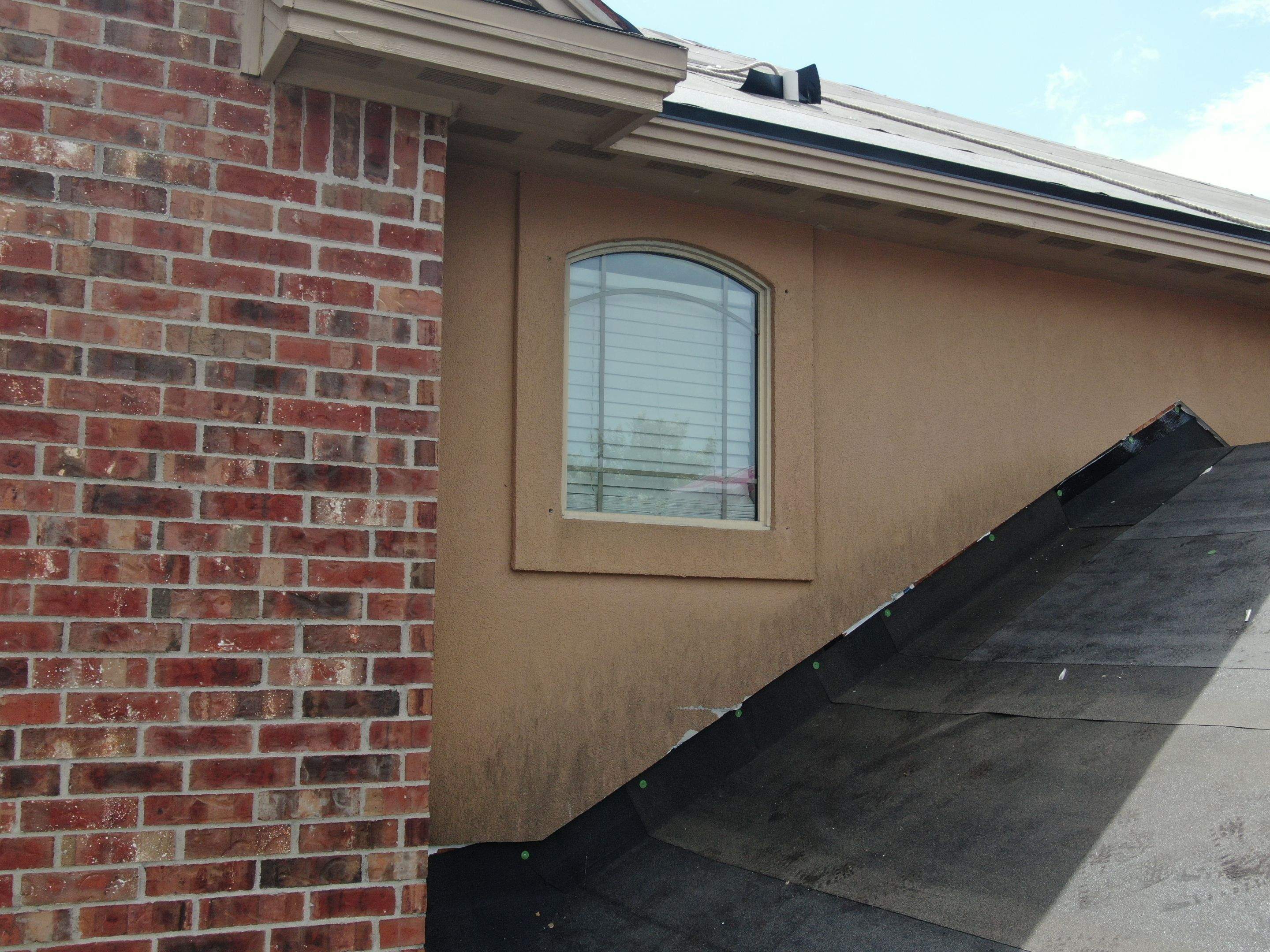 Flashing Stucco above the Roof by Bayfront Roofing and Construction