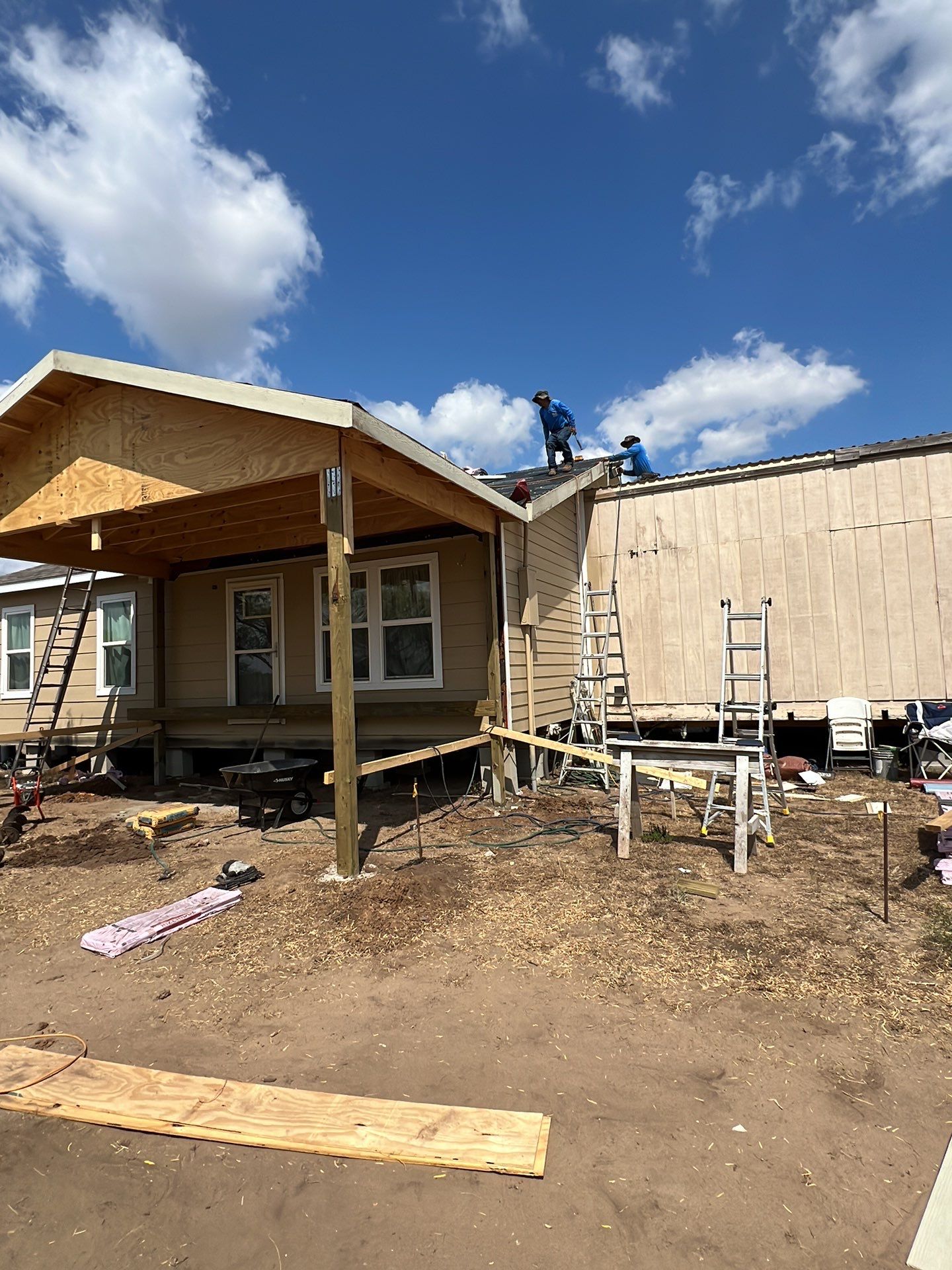 Front Porch Sitt'n by Bayfront Roofing and Construction