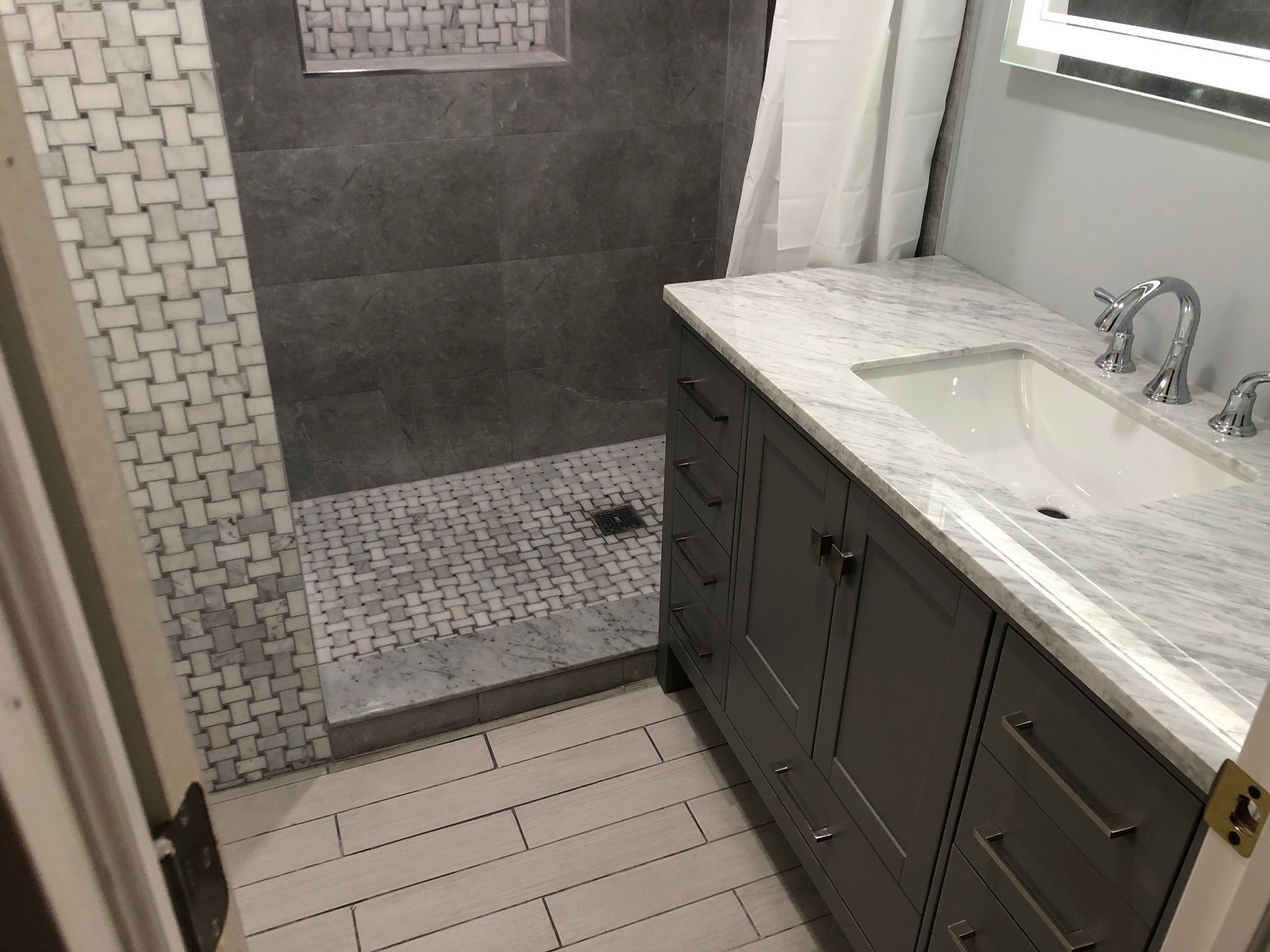 Bathroom Remodel using Tile by Home Concepts Construction