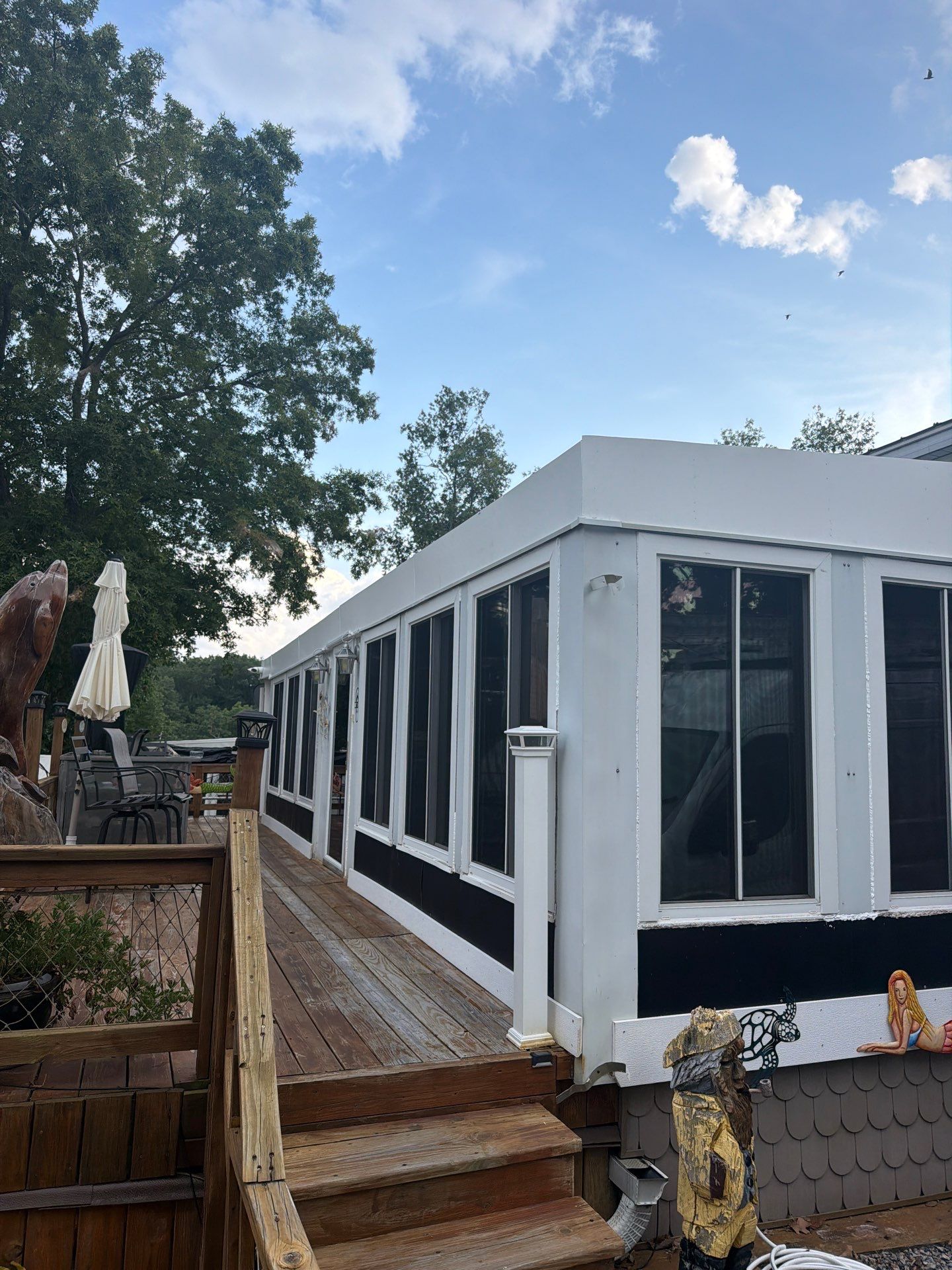 White Standing Seam Metal Roof Installation in Wake, VA by Cade Construction