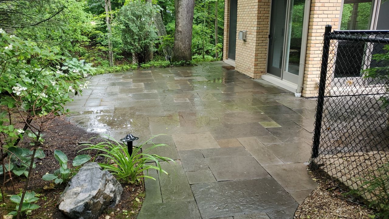 Bluestone patio cleaning by Northern Power Washing LLC.