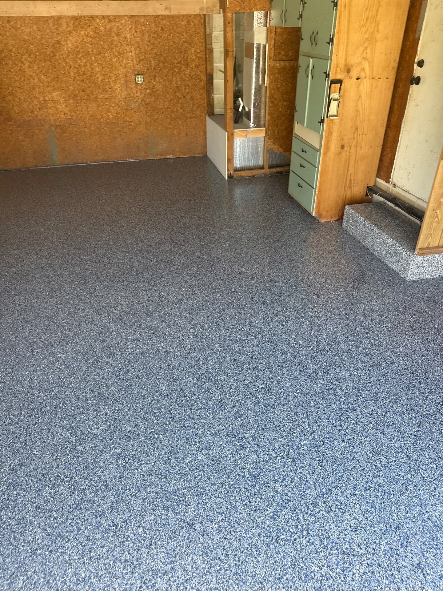 Garage in Midnight by Innovative Concrete Coatings 