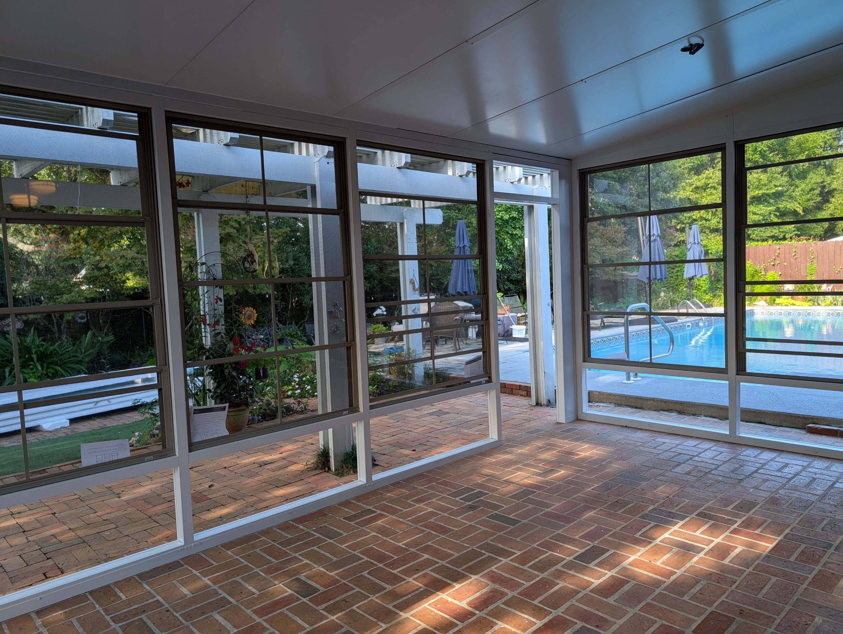 Pensacola Screen Room with Vinyl Slliders by Titan Sunrooms