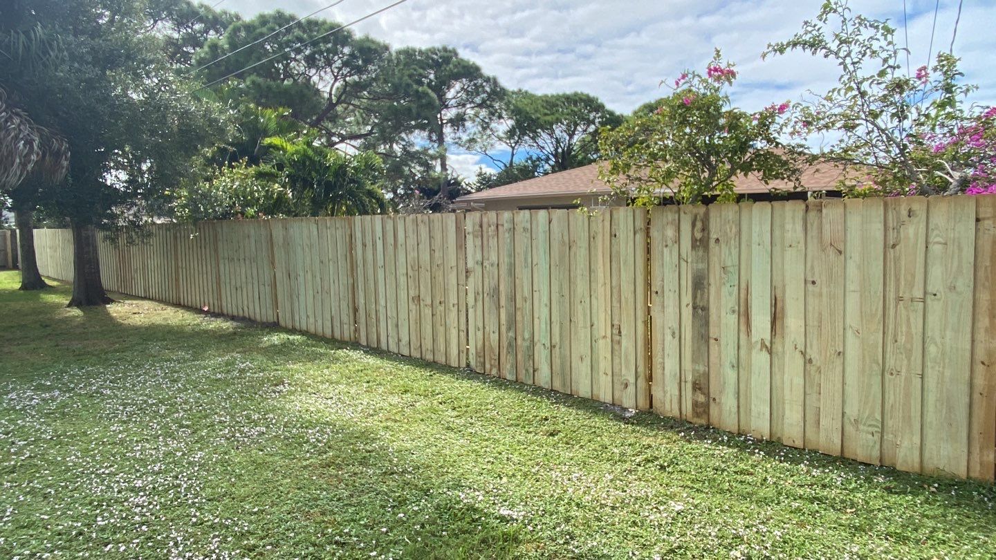 Wood Fence Installation using Board on Board Wood Fence by Asap fence and gates, LLC